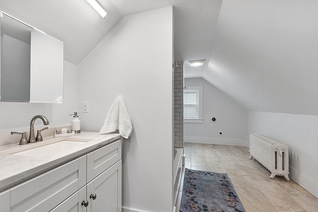 136 Groton Road North Chelmsford, MA 01863 - Photo 34 of 41 a bathroom with a sink and a mirror