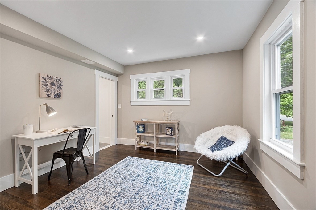 136 Groton Road North Chelmsford, MA 01863 - Photo 37 of 41 a living room with furniture and a window
