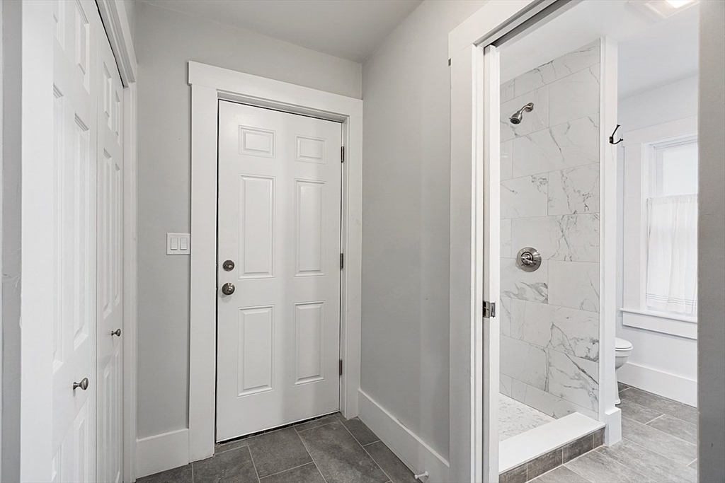 136 Groton Road North Chelmsford, MA 01863 - Photo 38 of 41 a bathroom with a glass shower door