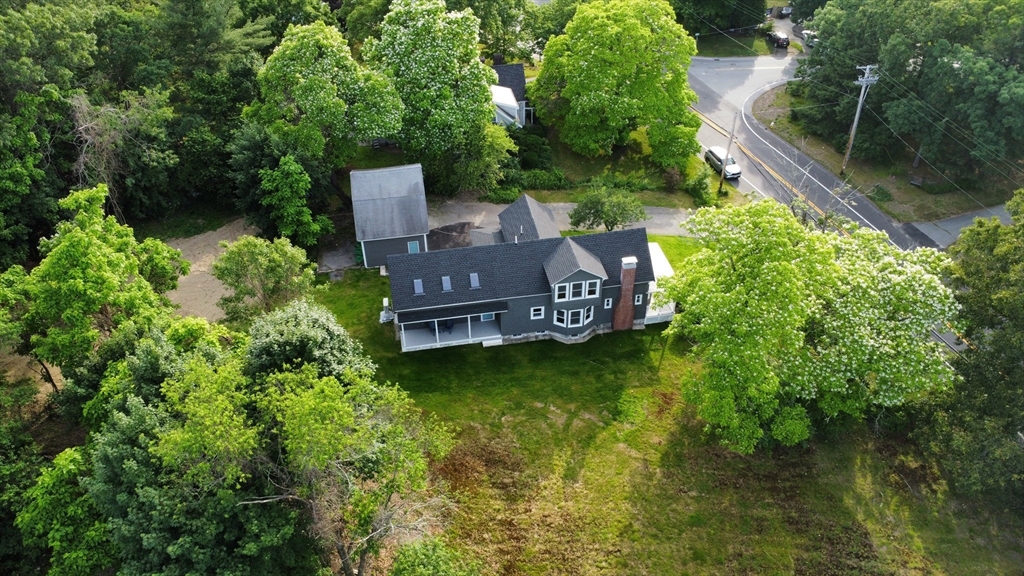 136 Groton Road North Chelmsford, MA 01863 - Photo 5 of 41 a view of a house with a yard