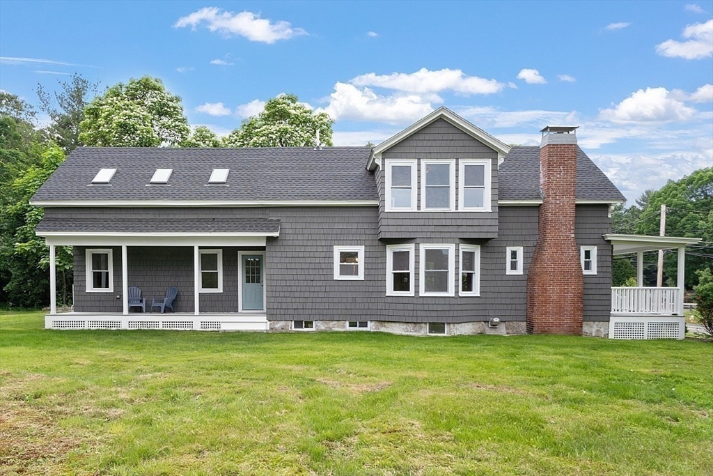 136 Groton Road North Chelmsford, MA 01863 - Photo 6 of 41 a front view of a house with garden