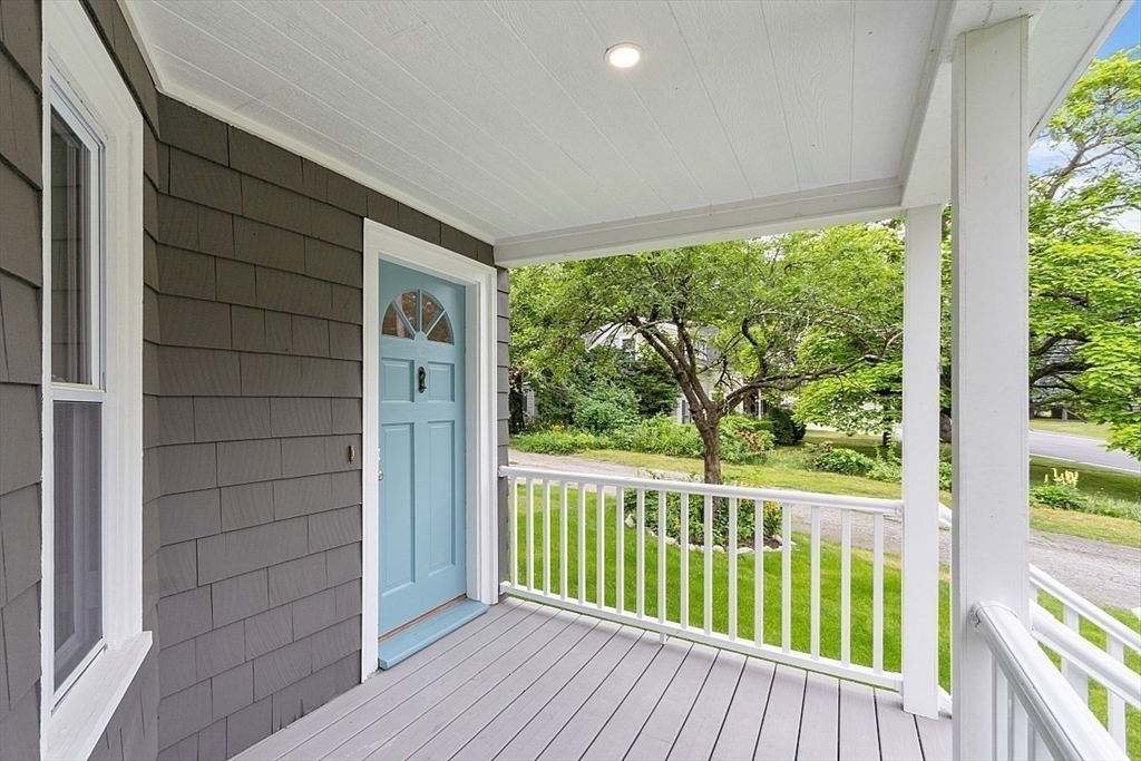 136 Groton Road North Chelmsford, MA 01863 - Photo 9 of 41 a view of a house with wooden floor and wooden fence