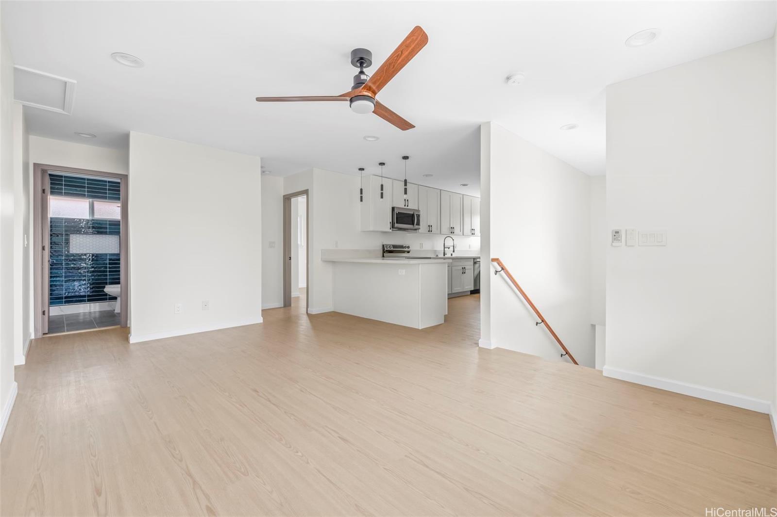 87-1474 Akowai Road, Unit A Waianae, HI 96792 - Photo 21 of 25 a view of a livingroom with a kitchen