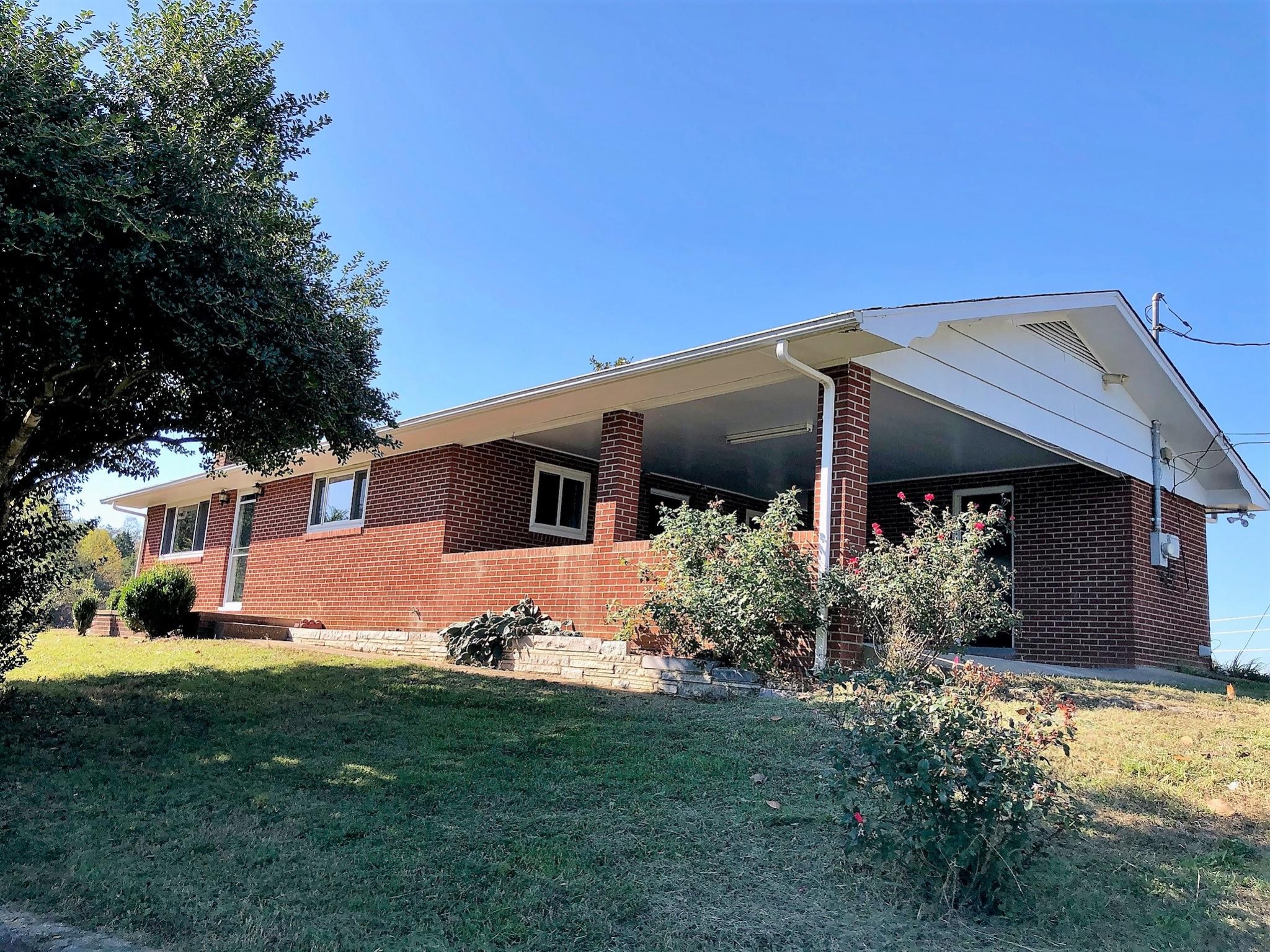 815 Lohman Road Sevierville, TN 37876 - Photo 1 of 14 a front view of house with yard