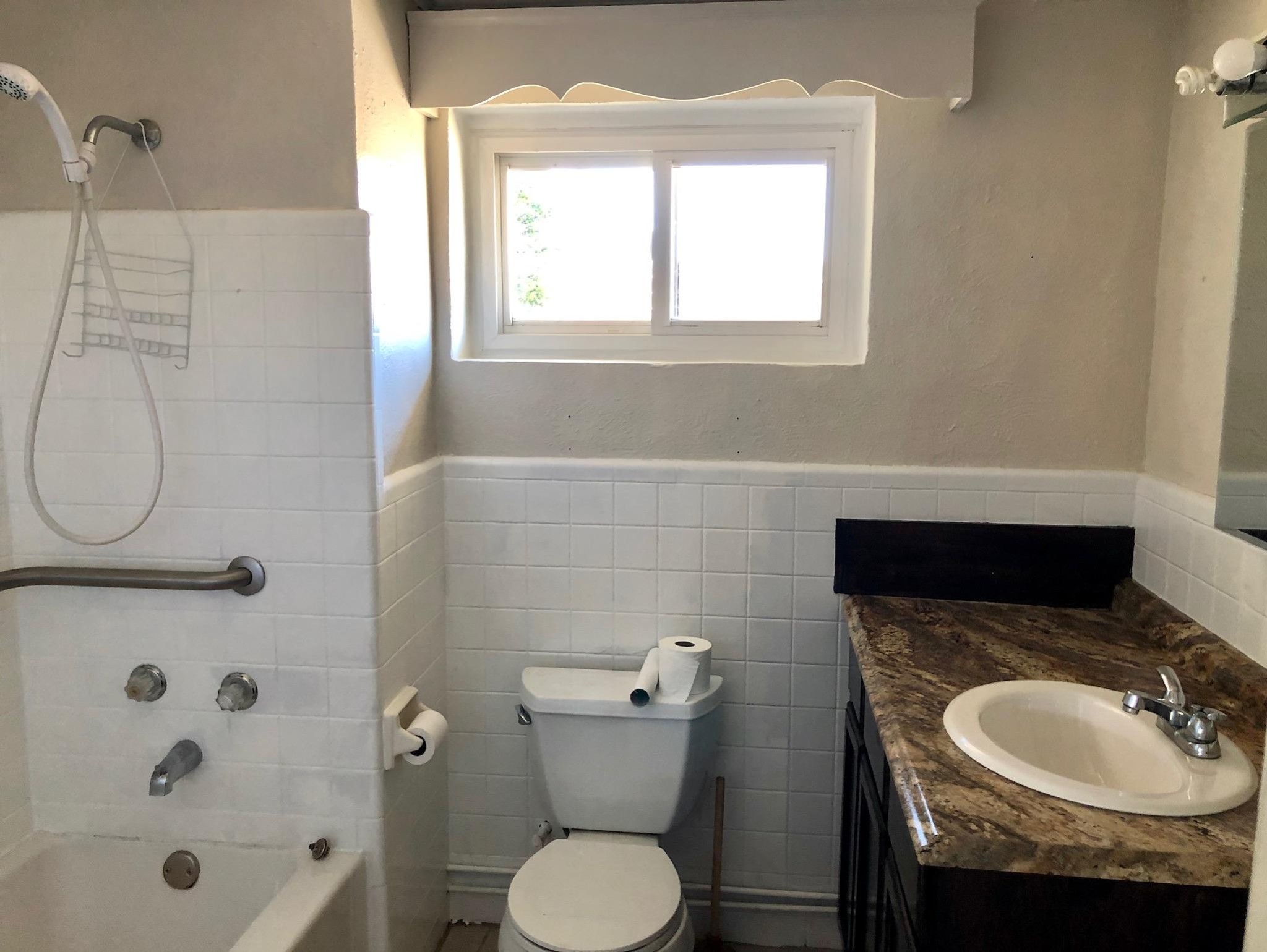 815 Lohman Road Sevierville, TN 37876 - Photo 7 of 14 a bathroom with a granite countertop sink toilet and shower