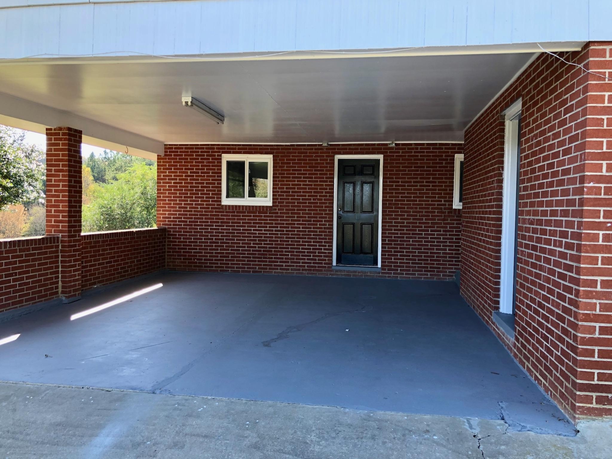815 Lohman Road Sevierville, TN 37876 - Photo 10 of 14 a view of an empty room with a window