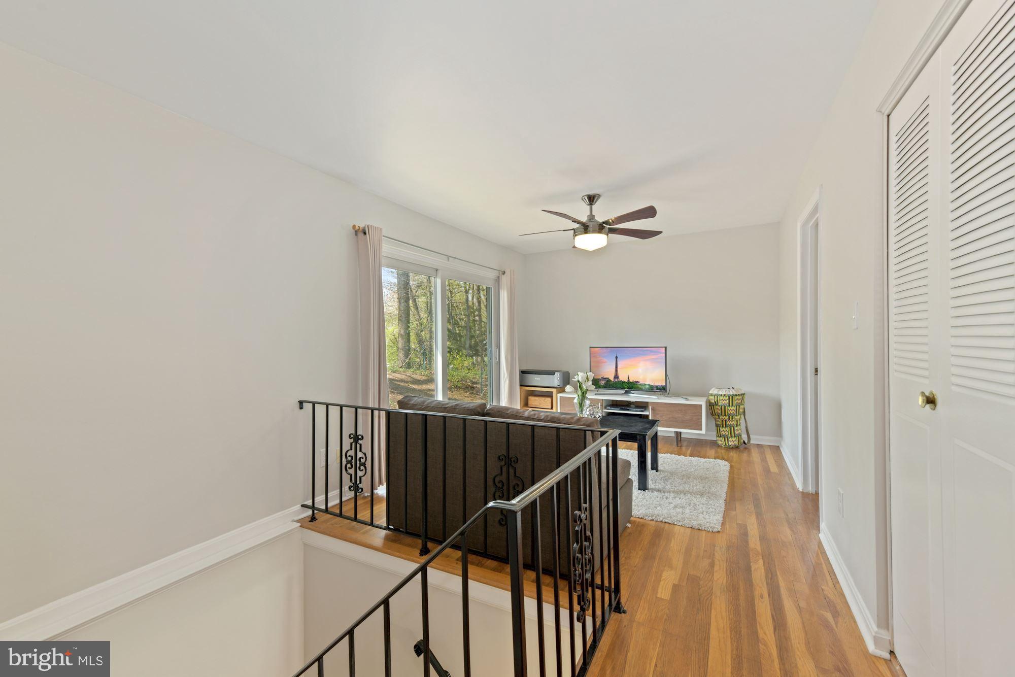 5228 Perth Court Springfield, VA 22151 - Photo 12 of 26 a view of a livingroom with furniture wooden floor and window