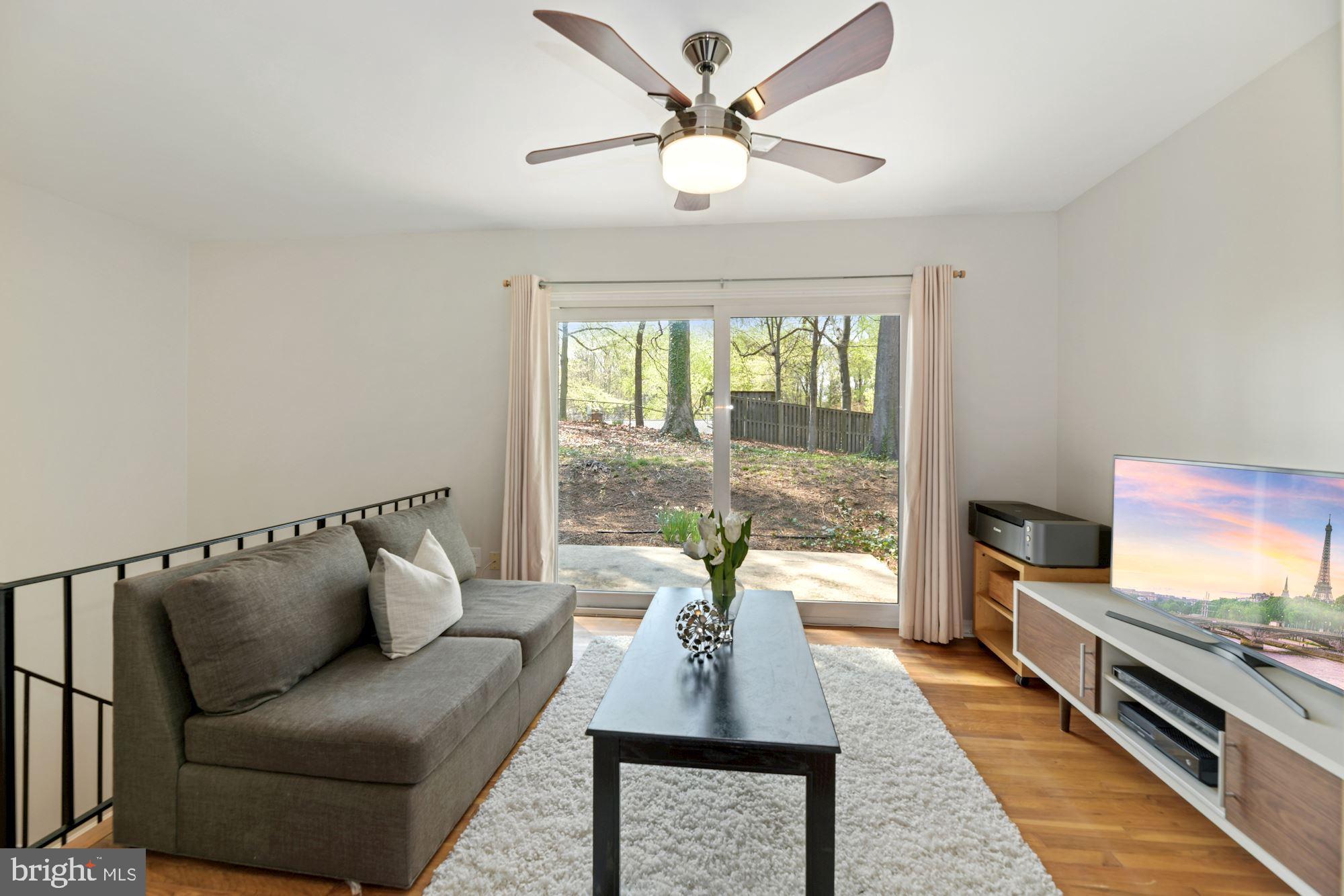 5228 Perth Court Springfield, VA 22151 - Photo 14 of 26 a living room with furniture and a large window