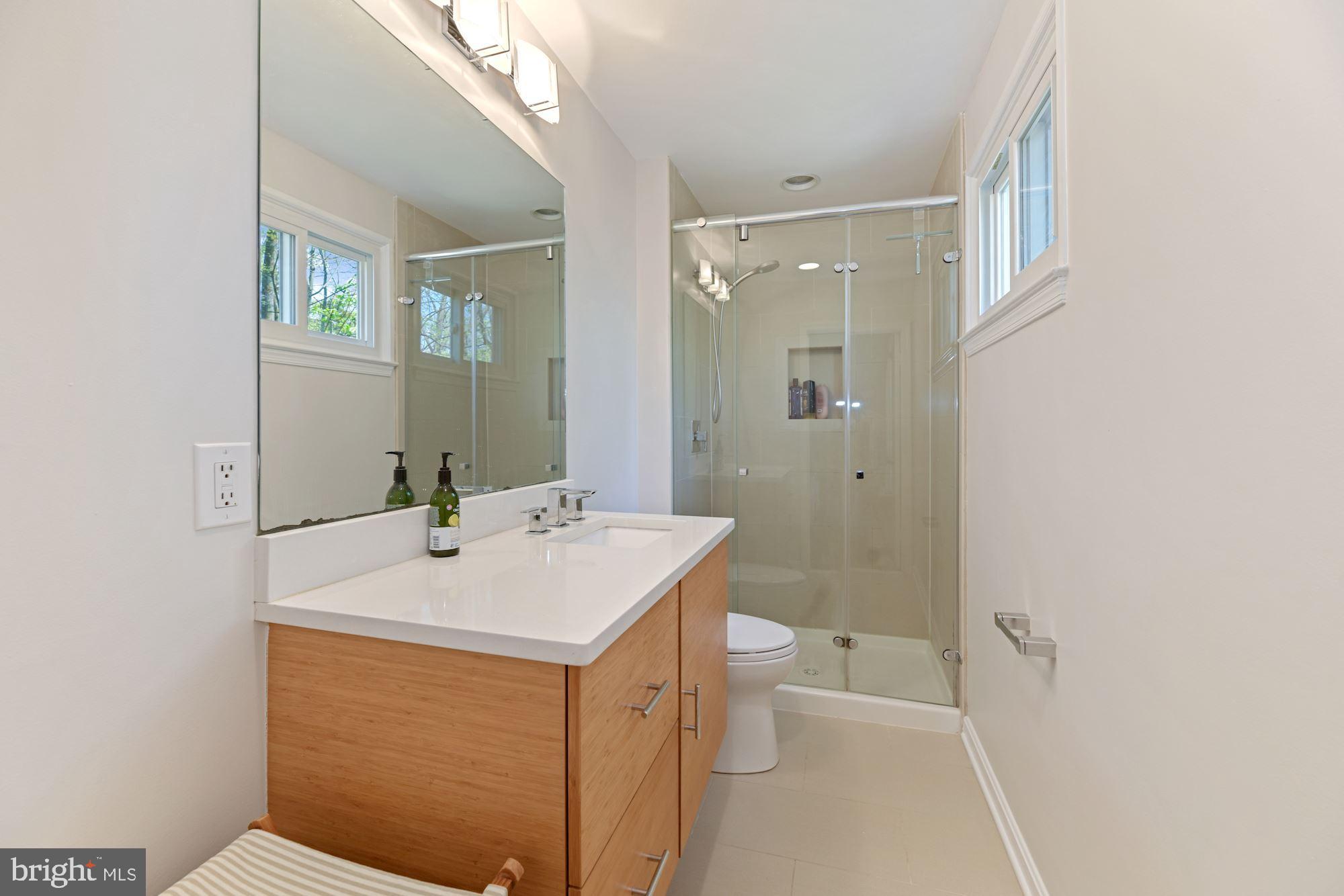 5228 Perth Court Springfield, VA 22151 - Photo 18 of 26 a bathroom with a sink a toilet and shower