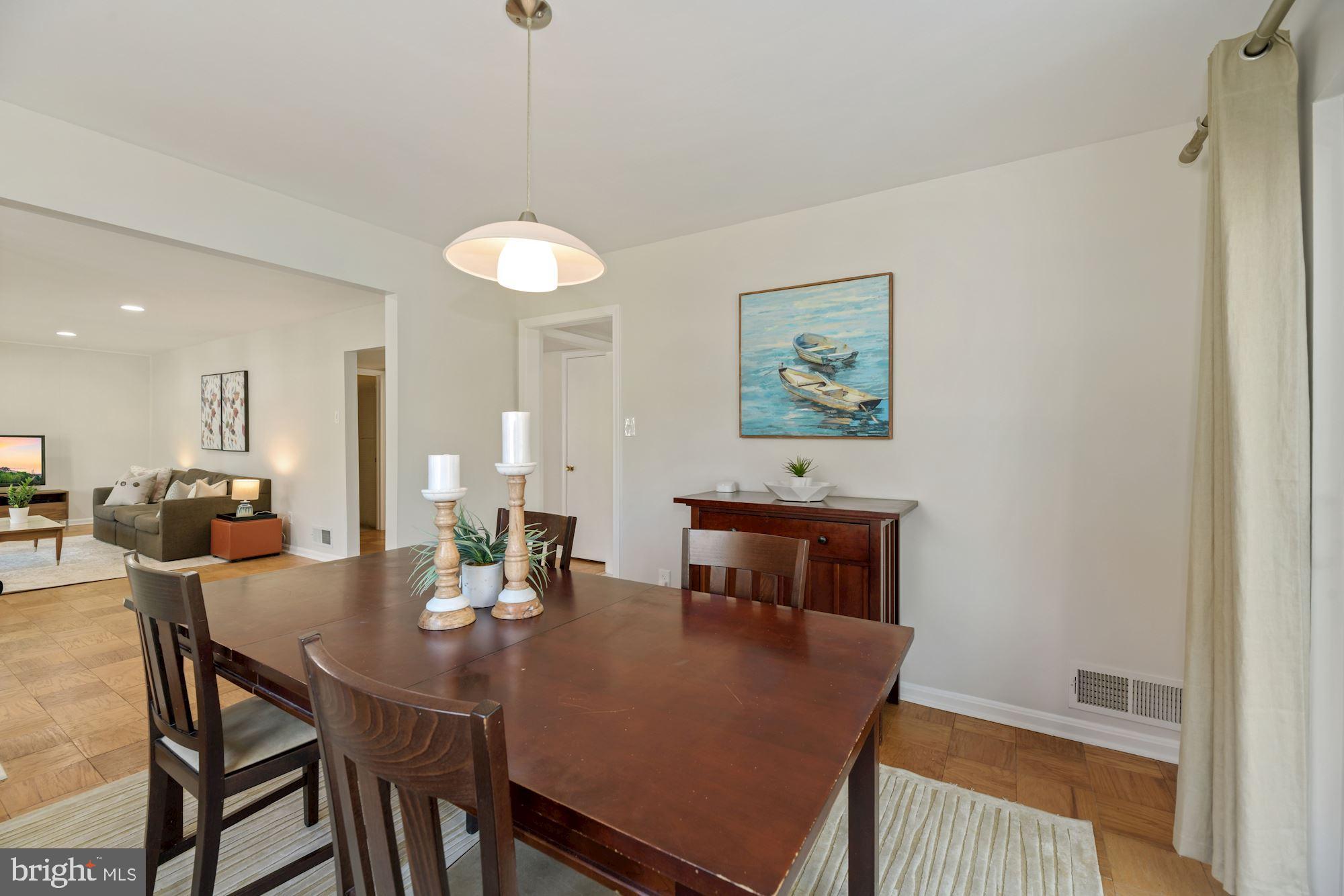 5228 Perth Court Springfield, VA 22151 - Photo 6 of 26 a view of a dining room with furniture