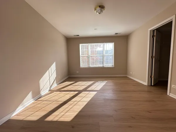 a view of an empty room and window