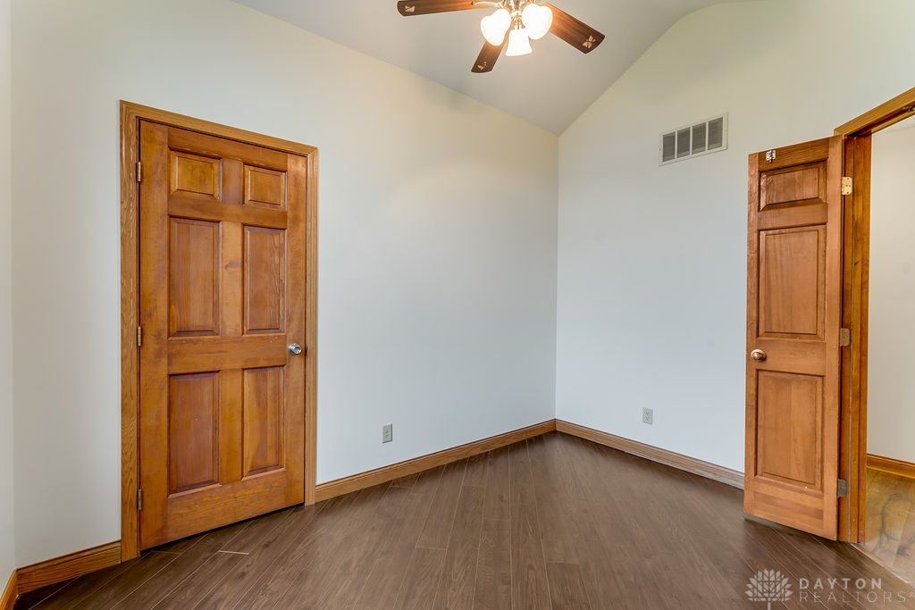 7400 Cook-Jones Road Waynesville, OH 45068 - Photo 21 of 72 Warm wood doors and rich flooring define this versatile room, ready for your personal touch.
