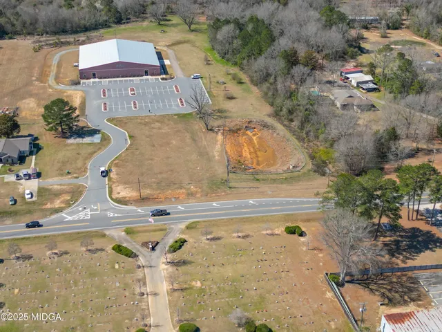 a view of swimming pool with outdoor seating
