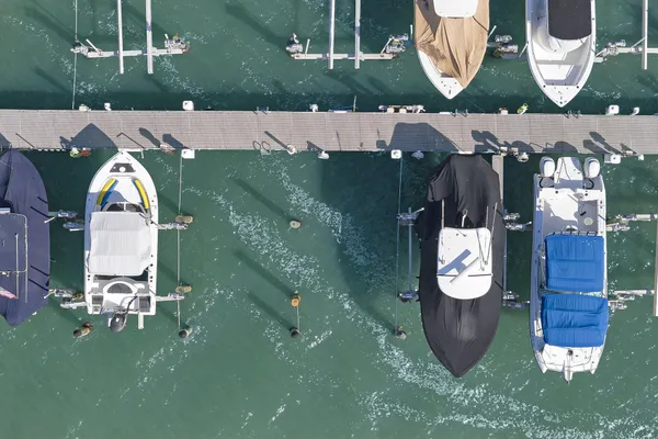 an aerial view of a house with a yard and garden