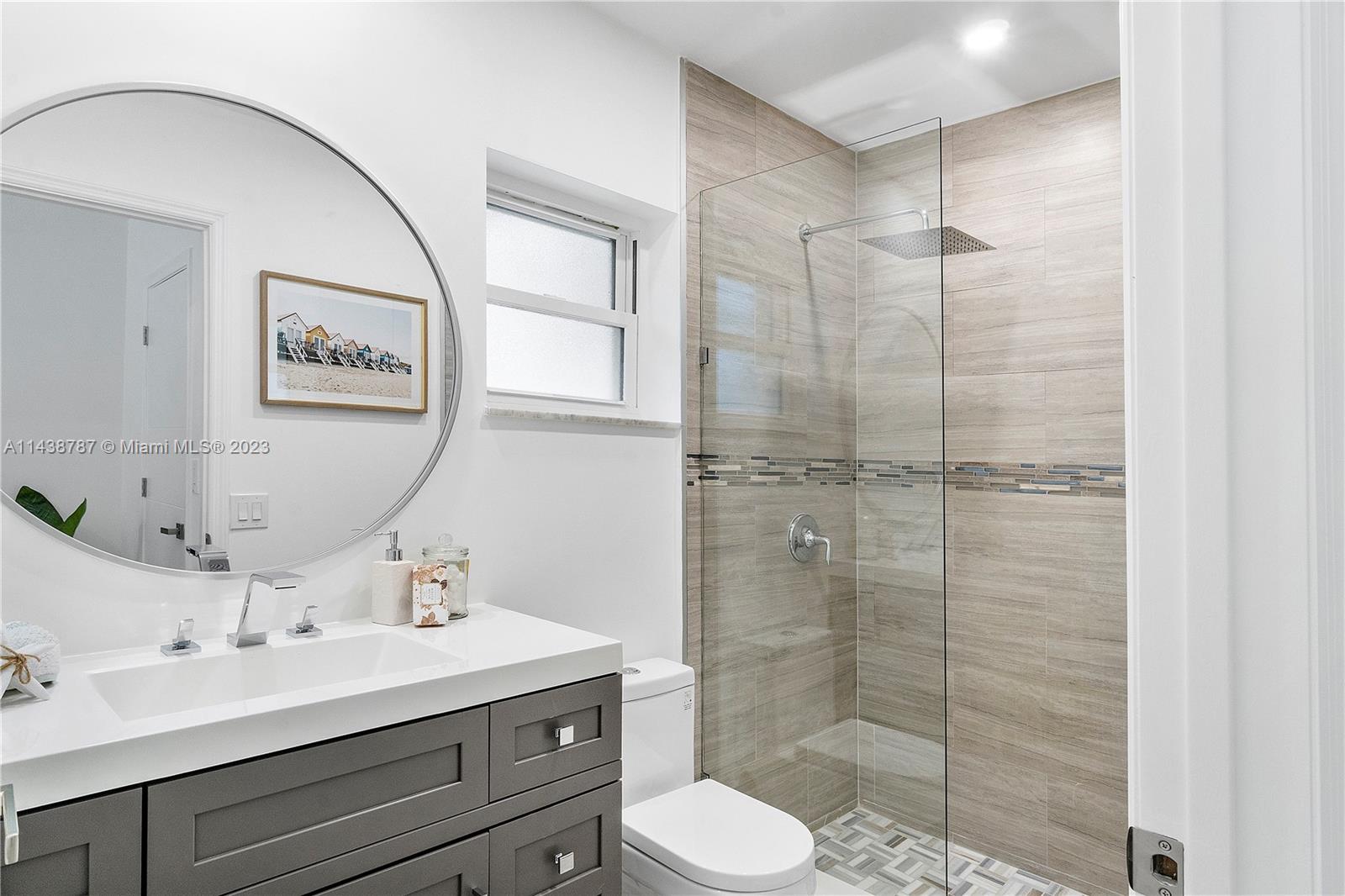 900 Northwest 9th Way Boca Raton, FL 33486 - Photo 26 of 48 a bathroom with a sink toilet and shower