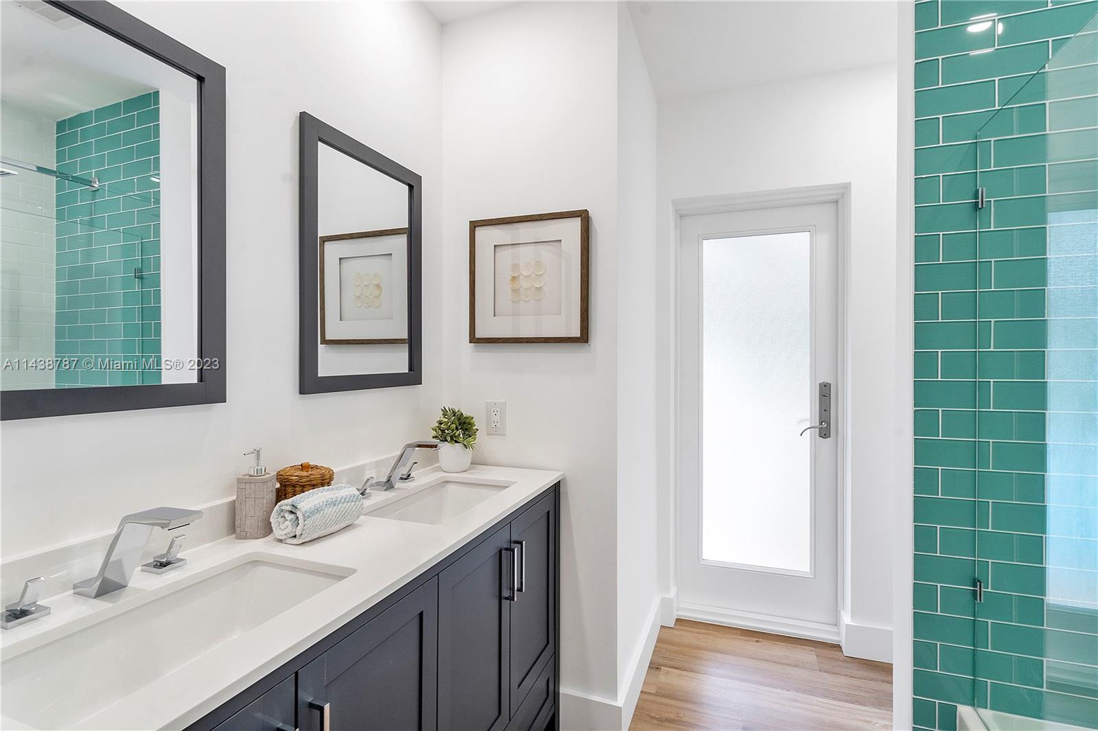 900 Northwest 9th Way Boca Raton, FL 33486 - Photo 33 of 48 a bathroom with a sink and a mirror
