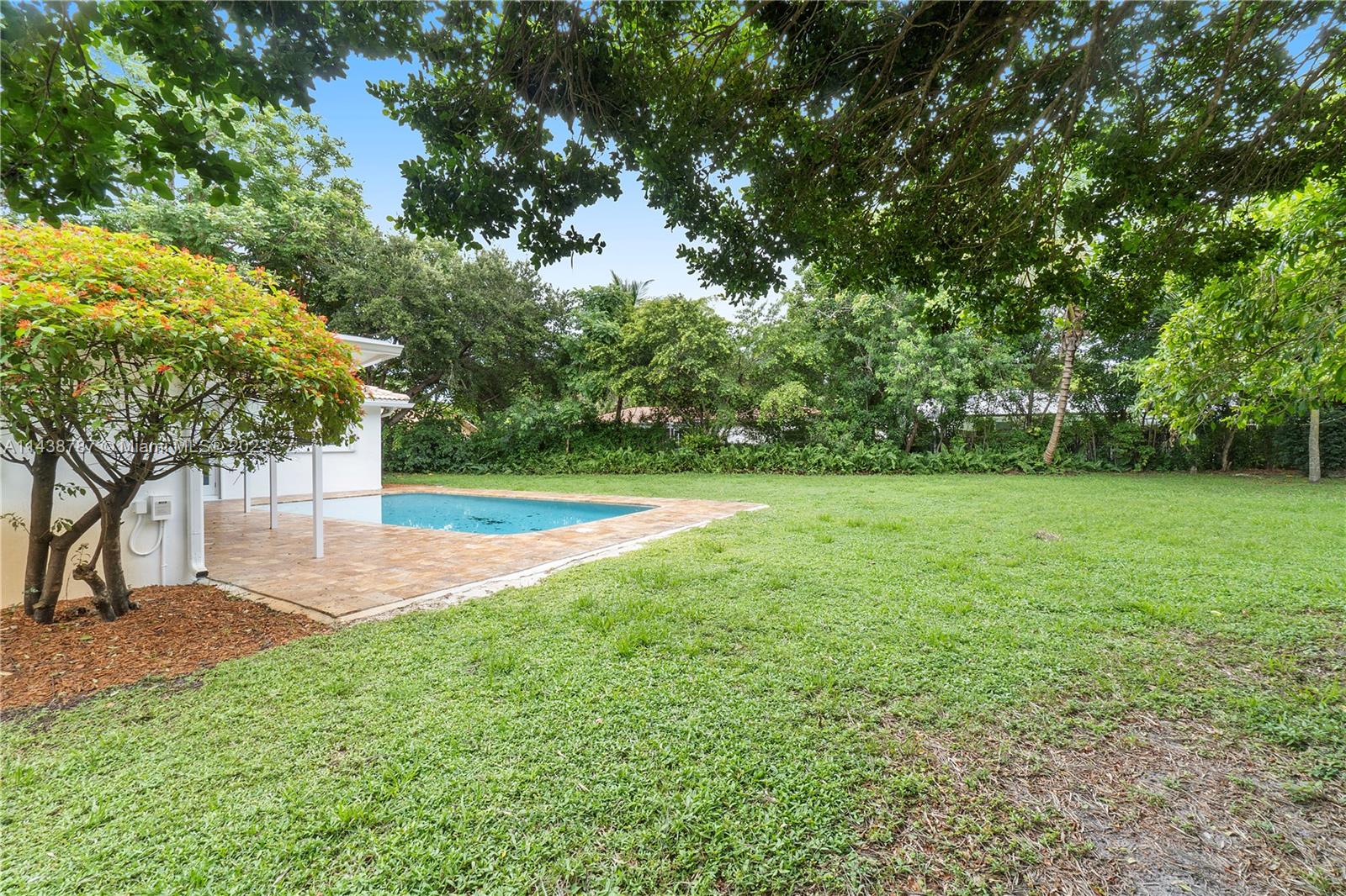 900 Northwest 9th Way Boca Raton, FL 33486 - Photo 42 of 48 a view of a garden with a tree