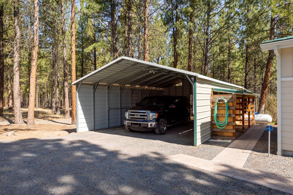 9660 Sprague River Road Chiloquin, OR 97624 - Photo 9 of 58 21 x 30 Covered Carport, wired, motion sensor lights