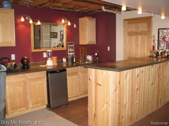24317 Carleton West Road Belleville, MI 48111 - Photo 22 of 23 Finished Basement With Wet Bar