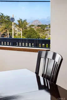 a kitchen with a refrigerator and a sink