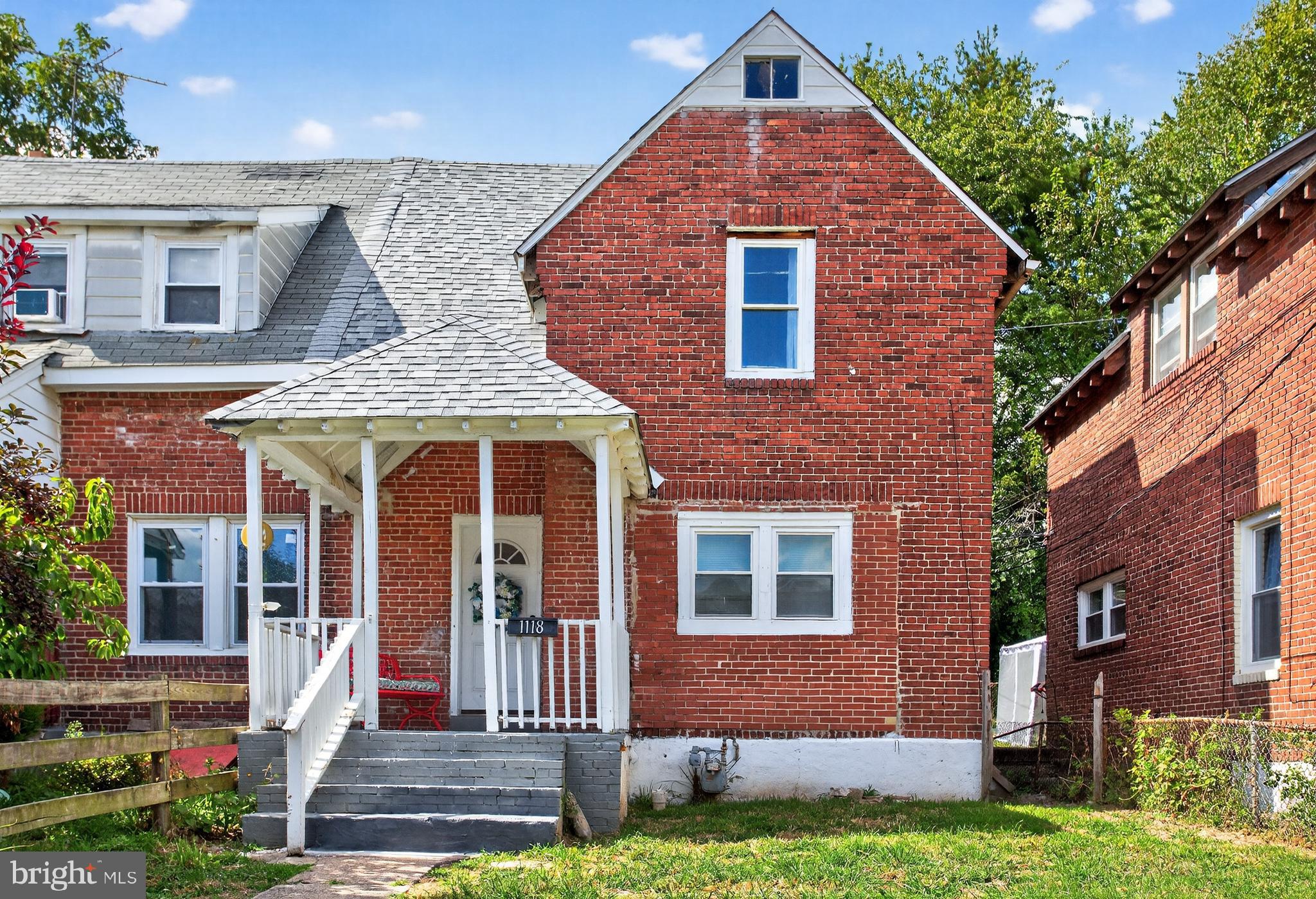 1118 Sterling Avenue Linwood, PA 19061 - Photo 1 of 38 a front view of a house with a yard
