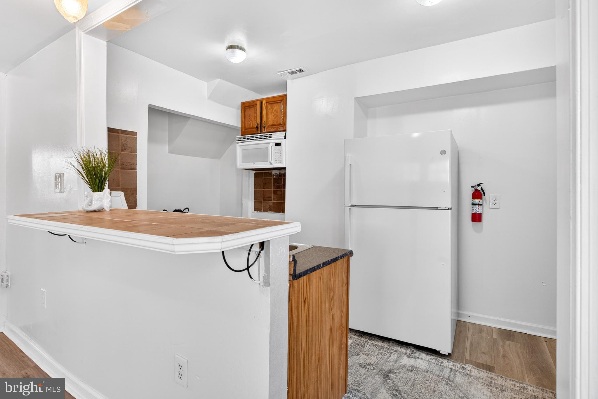 1118 Sterling Avenue Linwood, PA 19061 - Photo 14 of 38 a bathroom with a sink and a mirror