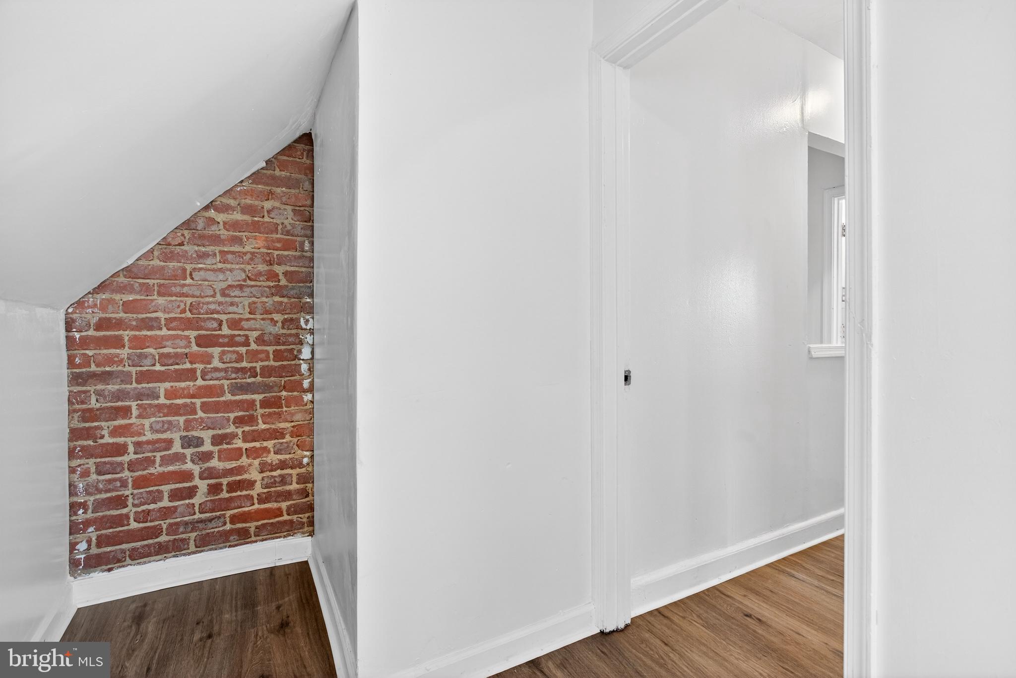 1118 Sterling Avenue Linwood, PA 19061 - Photo 23 of 38 a view of an empty room with wooden floor