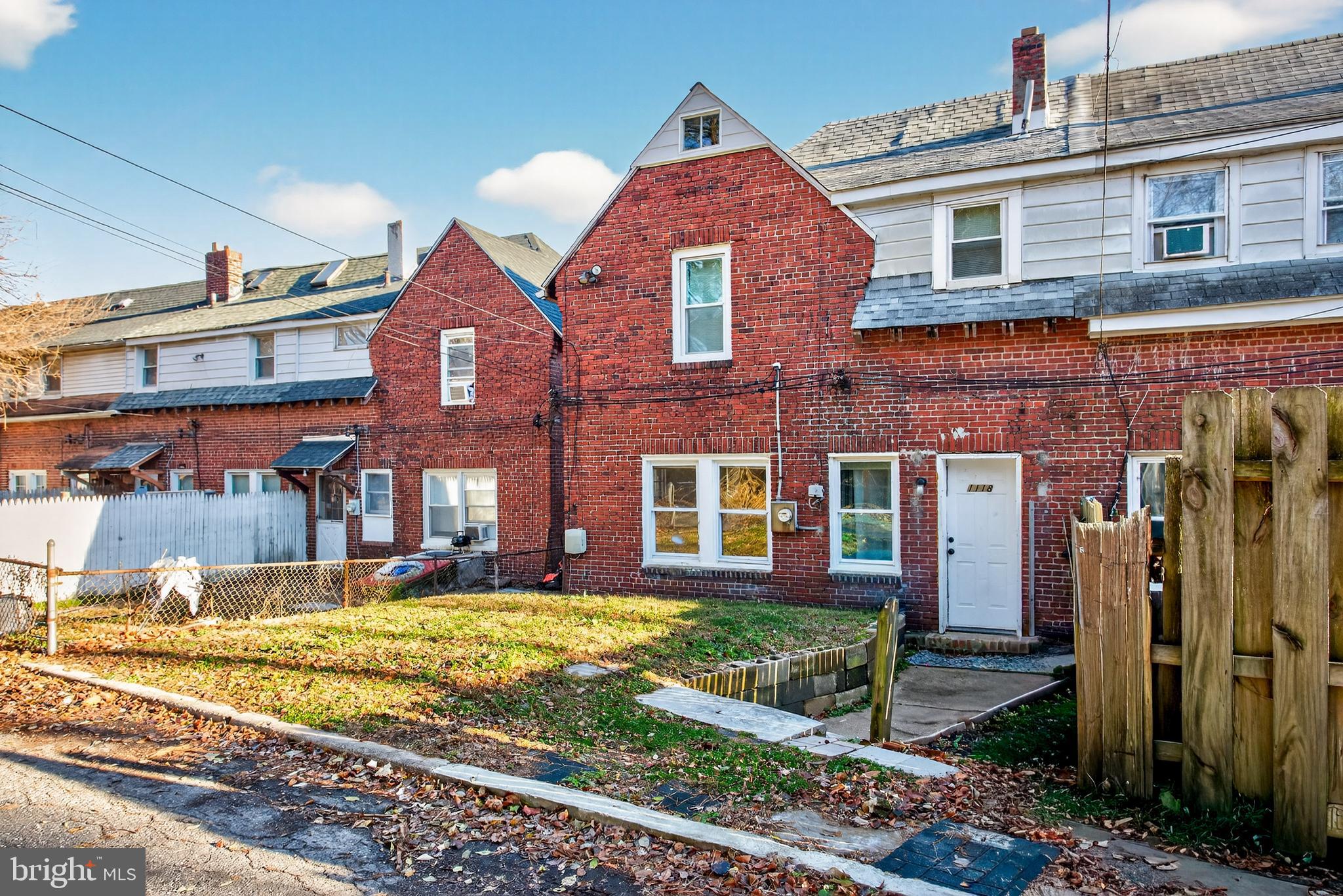 1118 Sterling Avenue Linwood, PA 19061 - Photo 33 of 38 a view of a brick building next to a yard