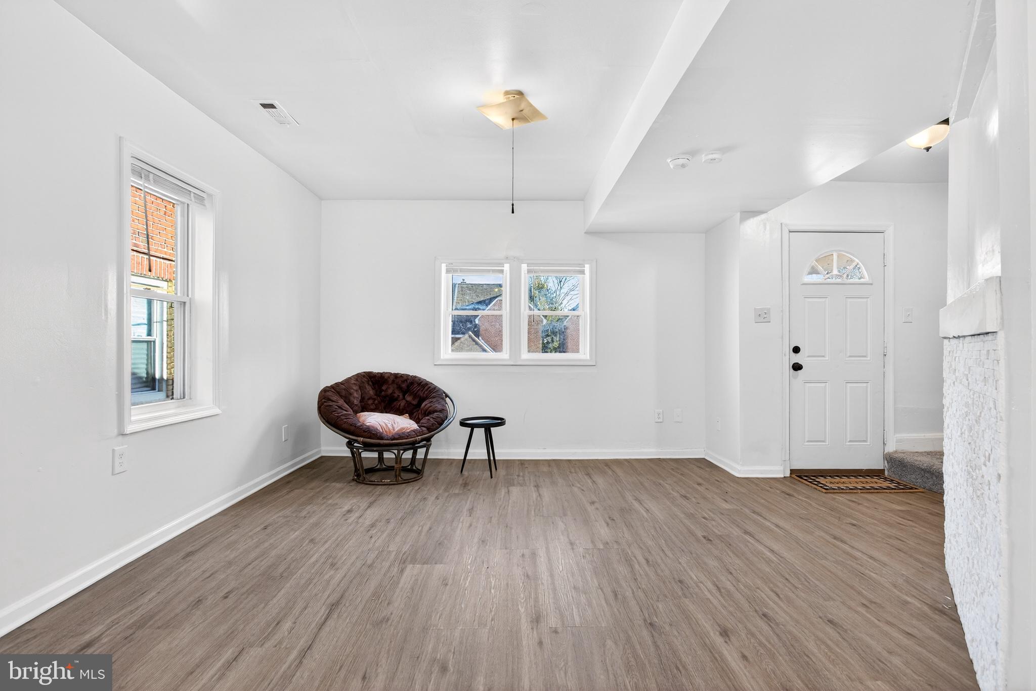 1118 Sterling Avenue Linwood, PA 19061 - Photo 8 of 38 a view of a livingroom with wooden floor and a window