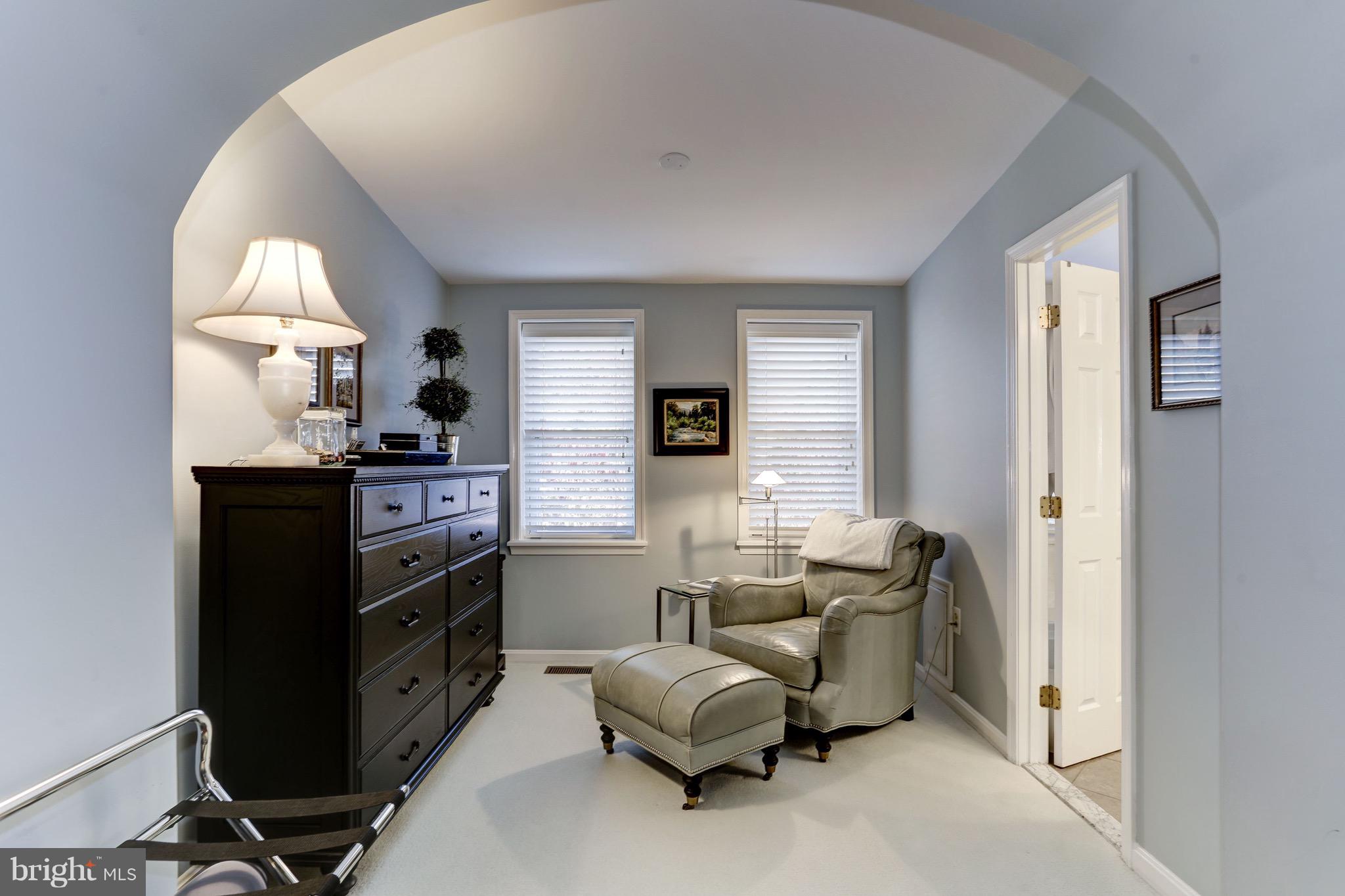 224 9th Street Southeast Washington, DC 20003 - Photo 16 of 29 a living room with furniture and a flat screen tv