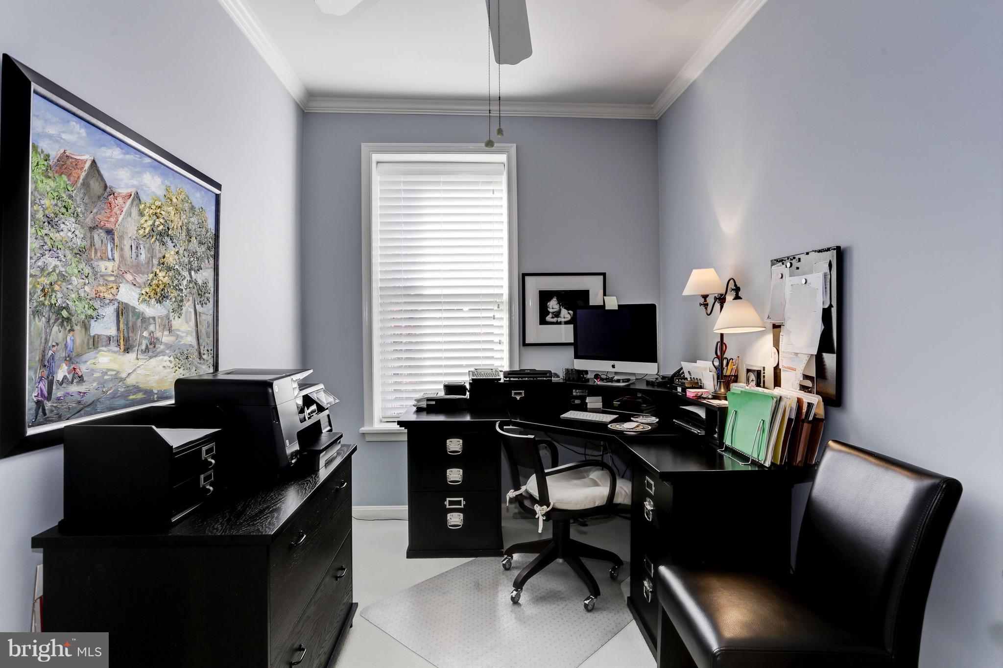 224 9th Street Southeast Washington, DC 20003 - Photo 21 of 29 a view of a workspace with furniture and a window