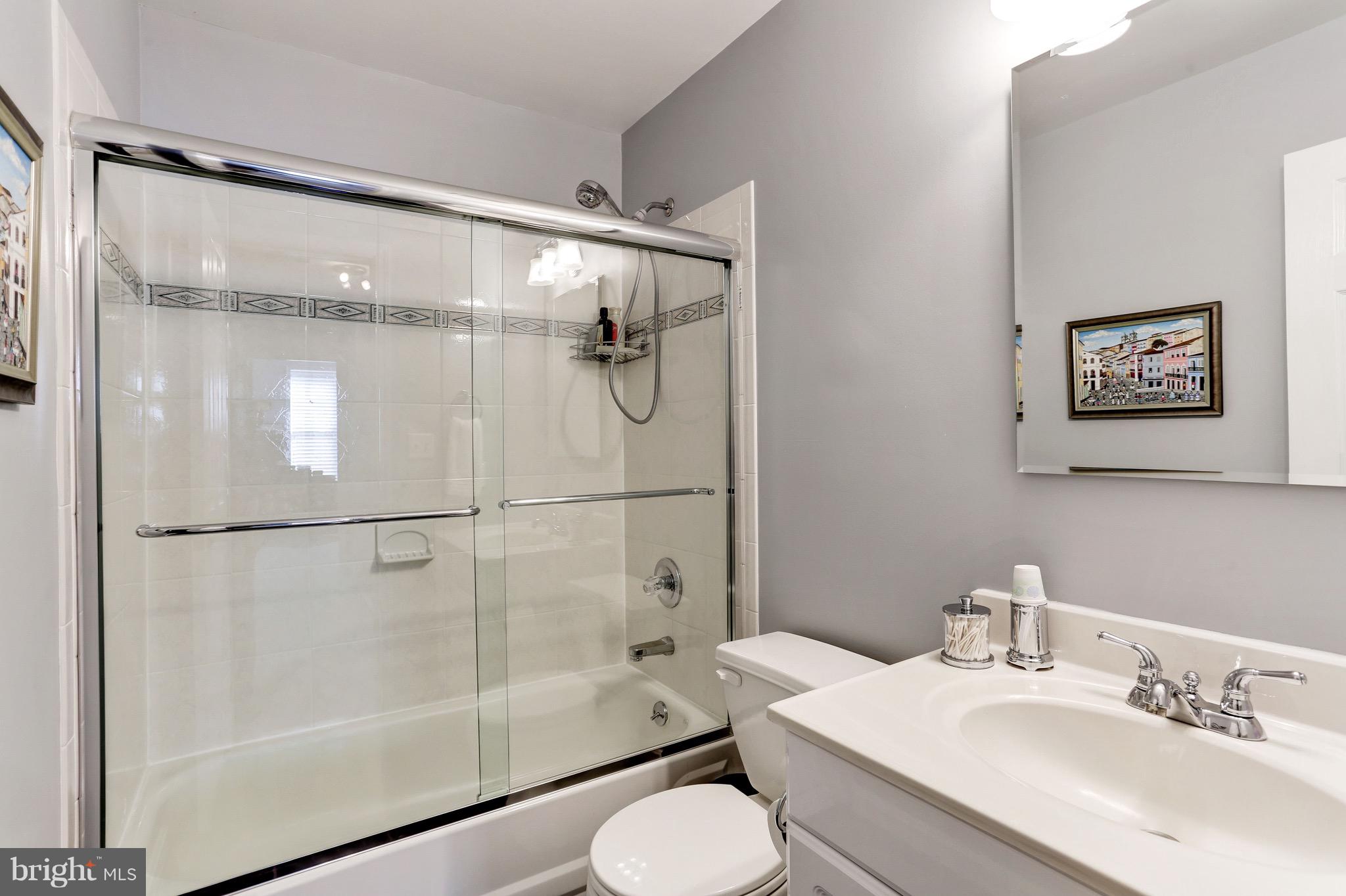 224 9th Street Southeast Washington, DC 20003 - Photo 22 of 29 a bathroom with a shower and toilet