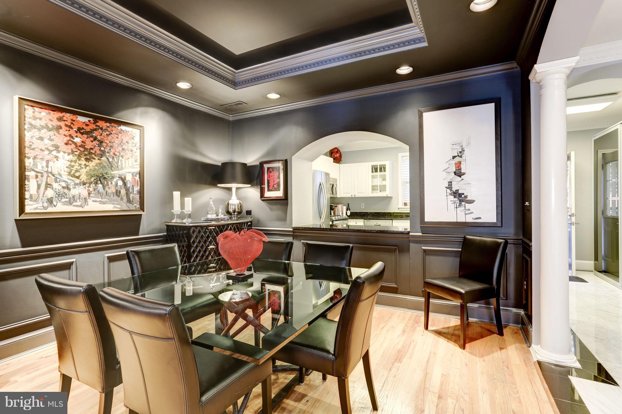 224 9th Street Southeast Washington, DC 20003 - Photo 6 of 29 a view of a dining room with furniture a rug and wooden floor