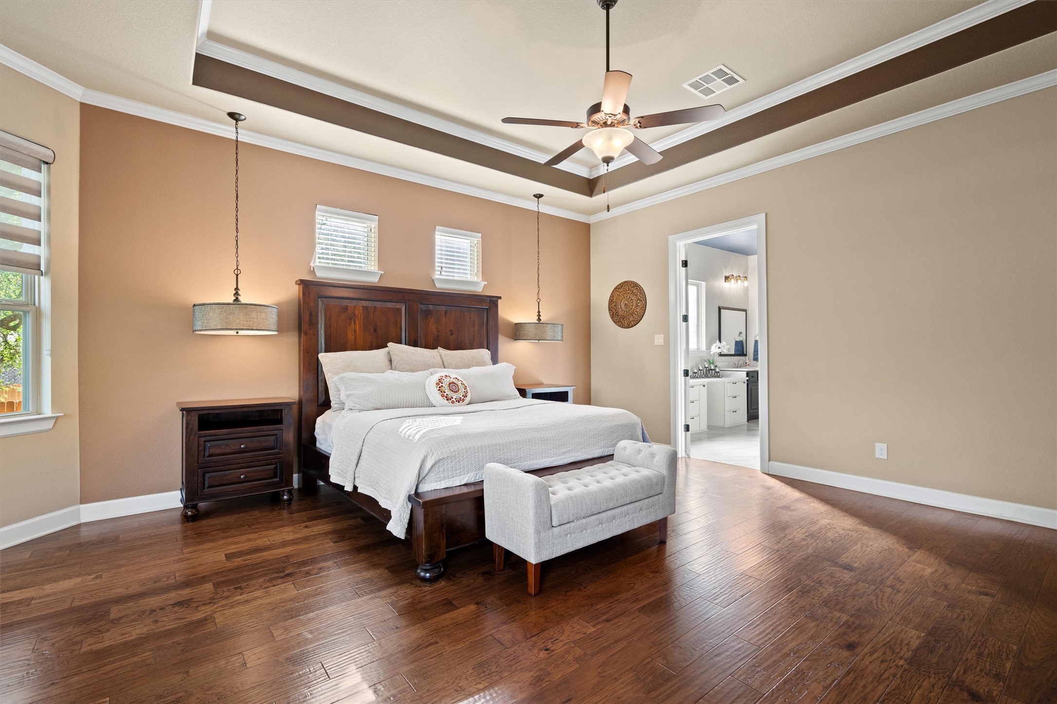 4005 Haight Street Round Rock, TX 78681 - Photo 19 of 40 a bed room with a bed and a chandelier