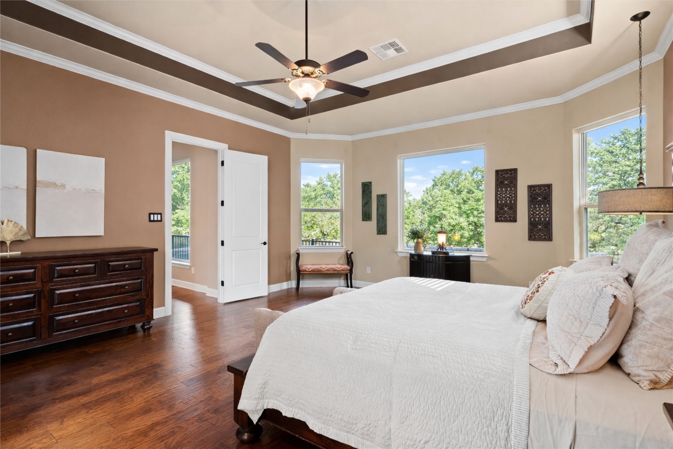 4005 Haight Street Round Rock, TX 78681 - Photo 20 of 40 a bedroom with a bed and a chandelier