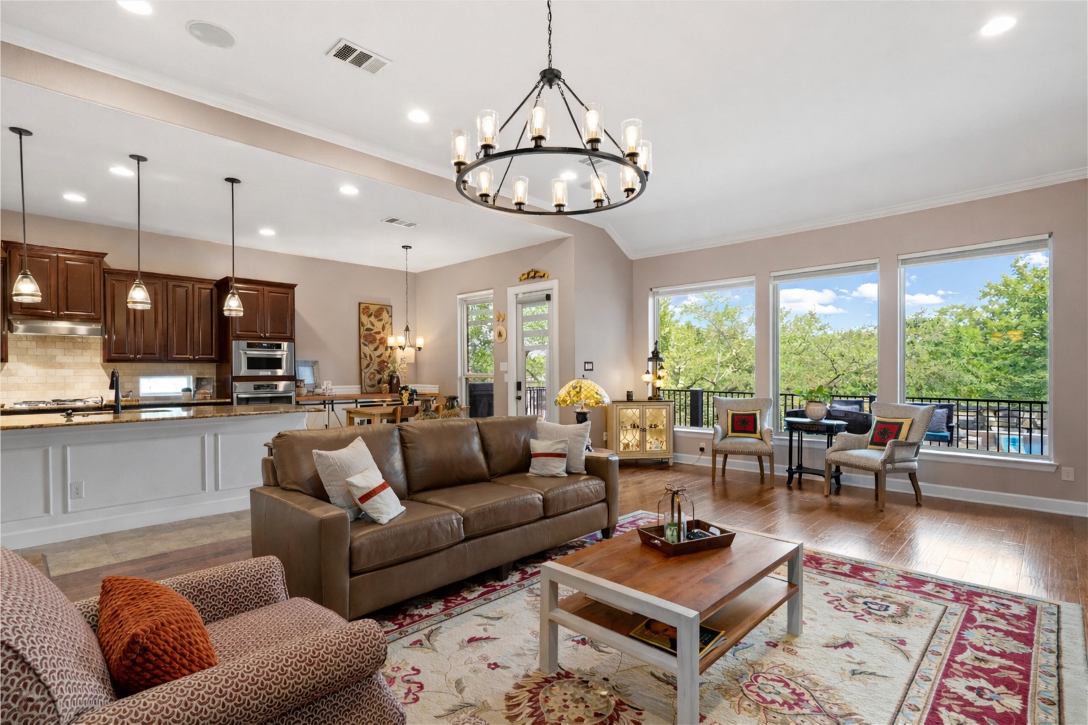 4005 Haight Street Round Rock, TX 78681 - Photo 2 of 40 a living room with furniture a rug and a large window