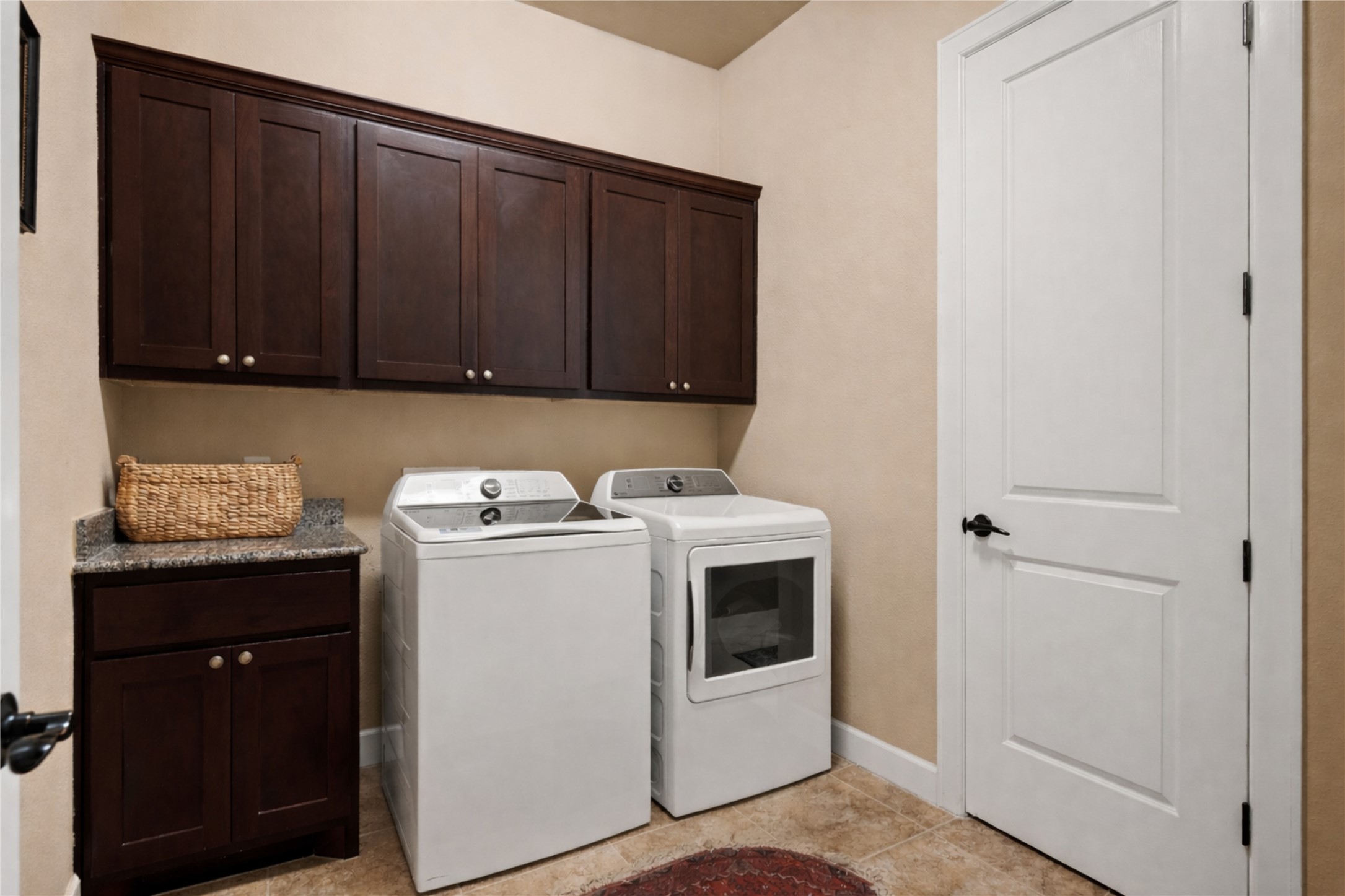 4005 Haight Street Round Rock, TX 78681 - Photo 24 of 40 a view of a storage and utility room with washer and dryer