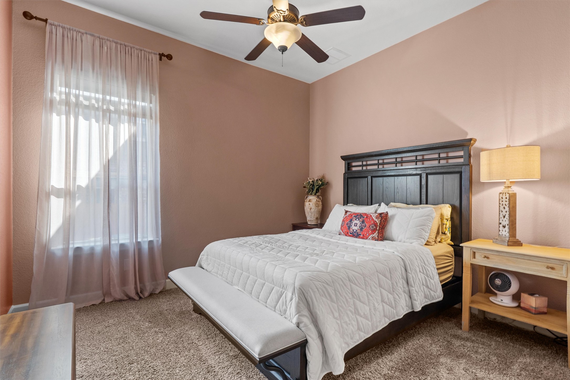 4005 Haight Street Round Rock, TX 78681 - Photo 25 of 40 a bedroom with a bed and a chandelier