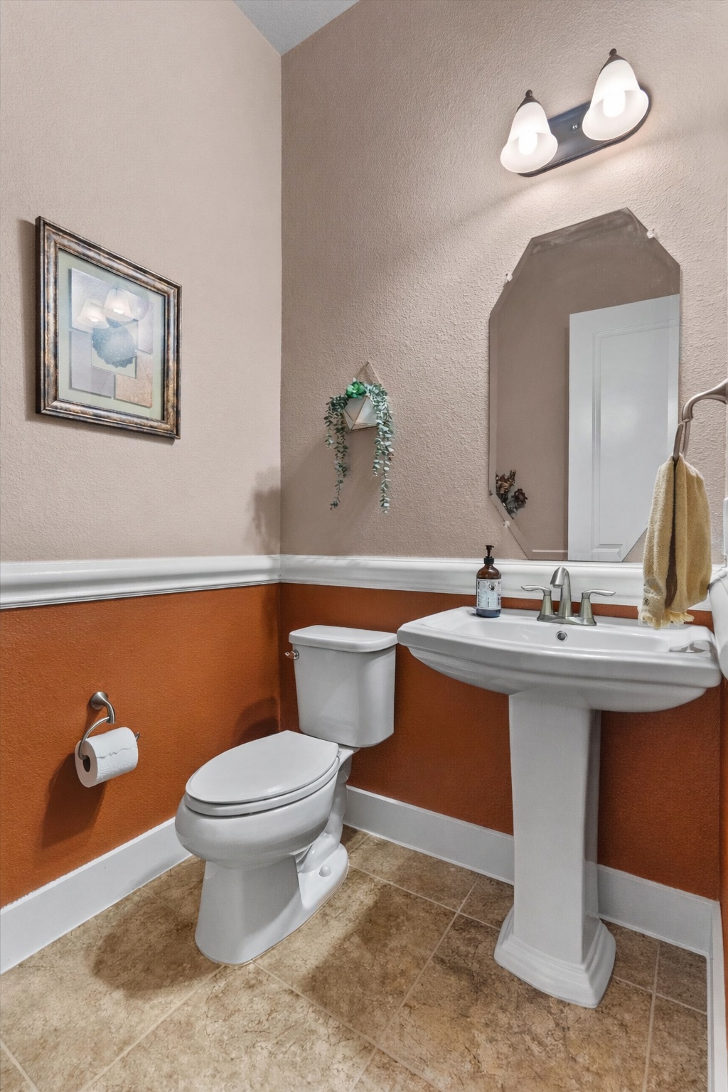 4005 Haight Street Round Rock, TX 78681 - Photo 28 of 40 a bathroom with a sink mirror and toilet