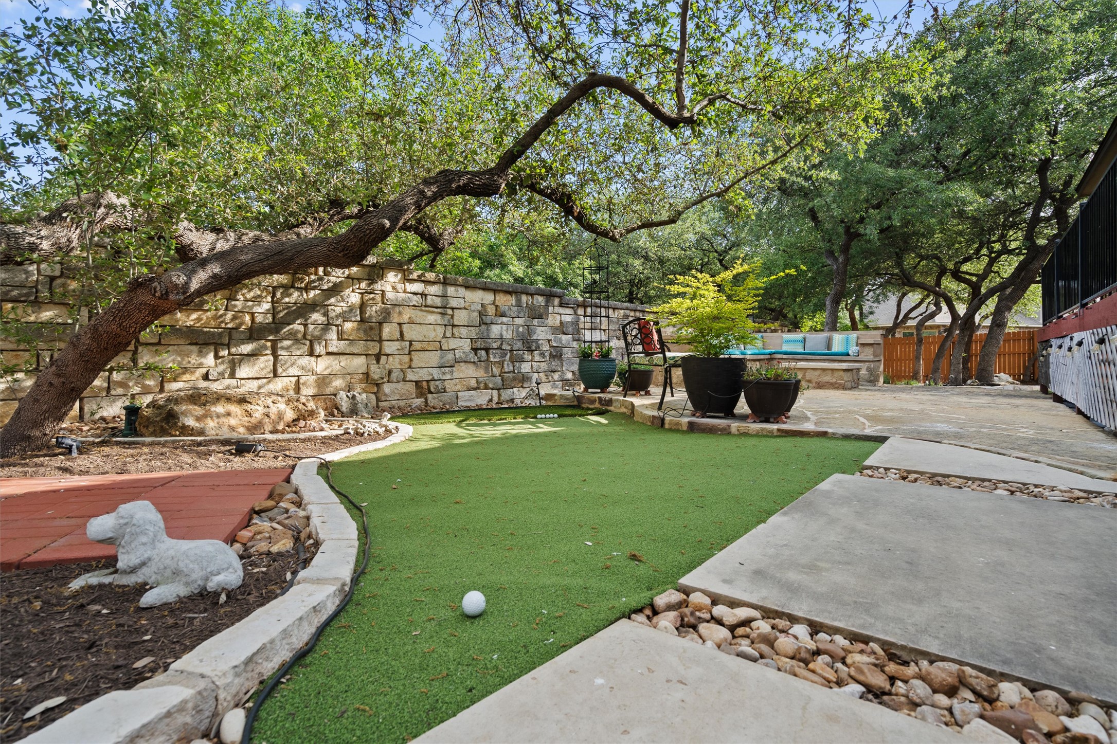 4005 Haight Street Round Rock, TX 78681 - Photo 34 of 40 a view of a backyard with large trees