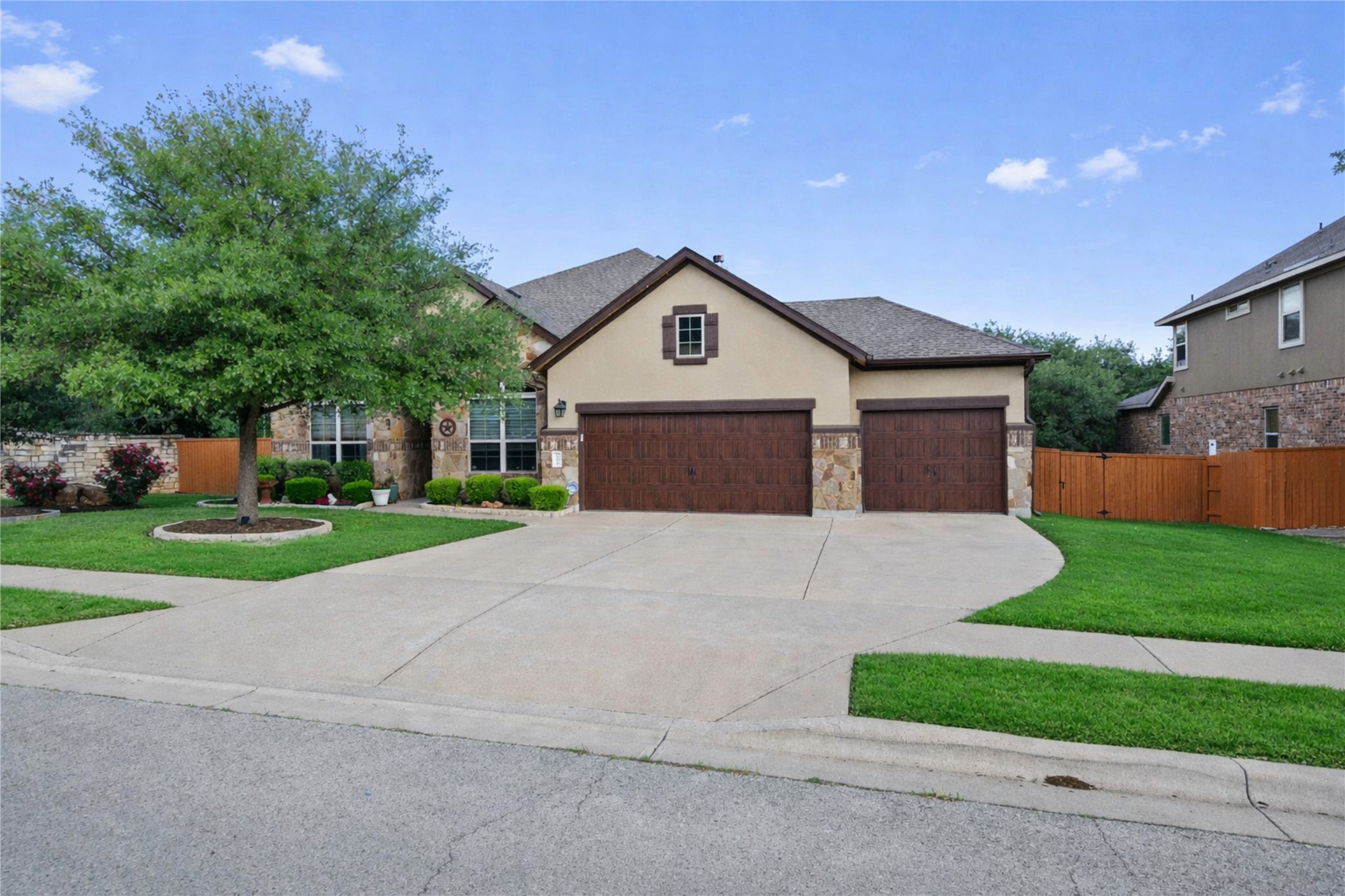4005 Haight Street Round Rock, TX 78681 - Photo 10 of 40 a front view of house with yard and green space