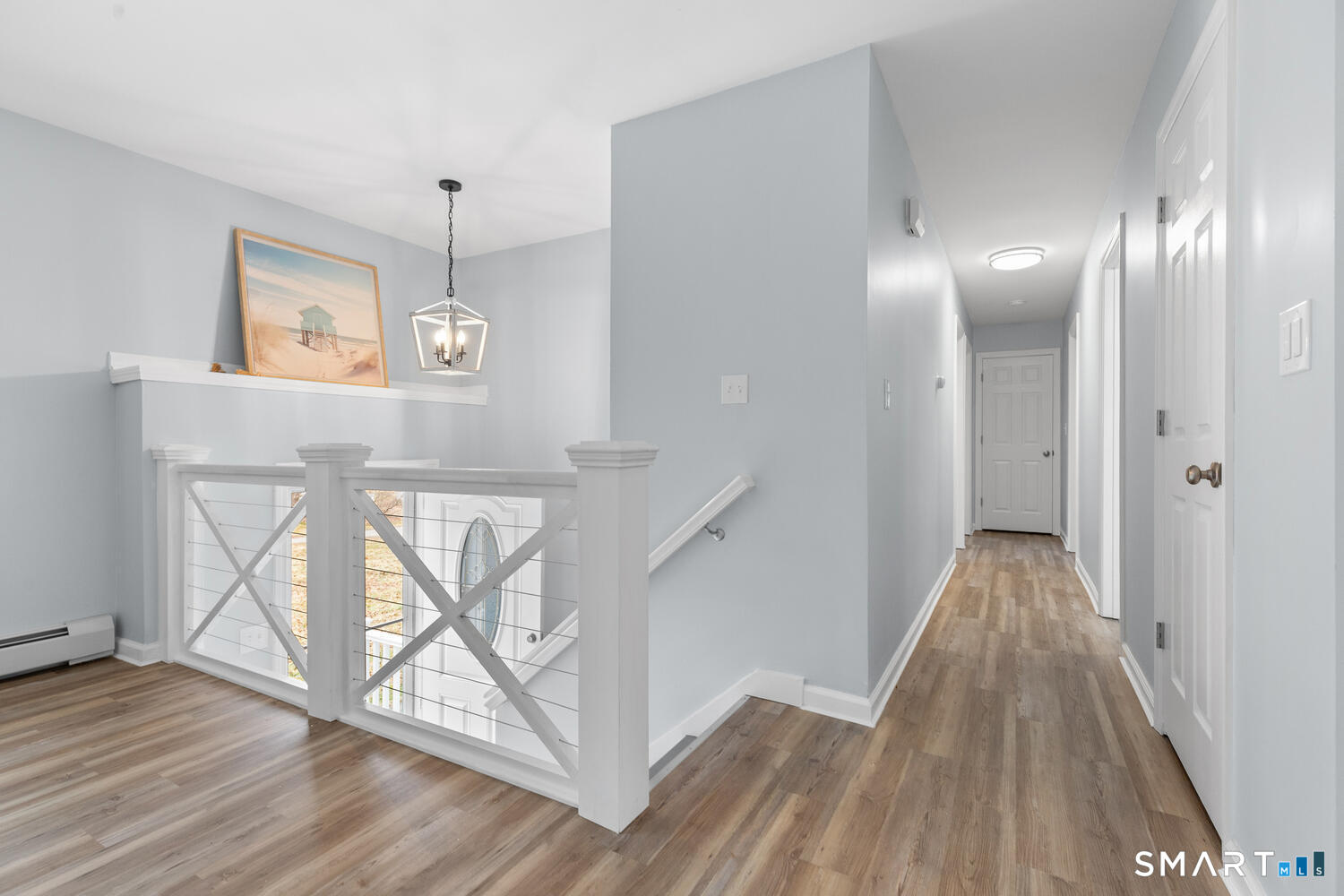 33 Deer Ridge Road Stonington, CT 06378 - Photo 11 of 25 a view of hallway with wooden floor
