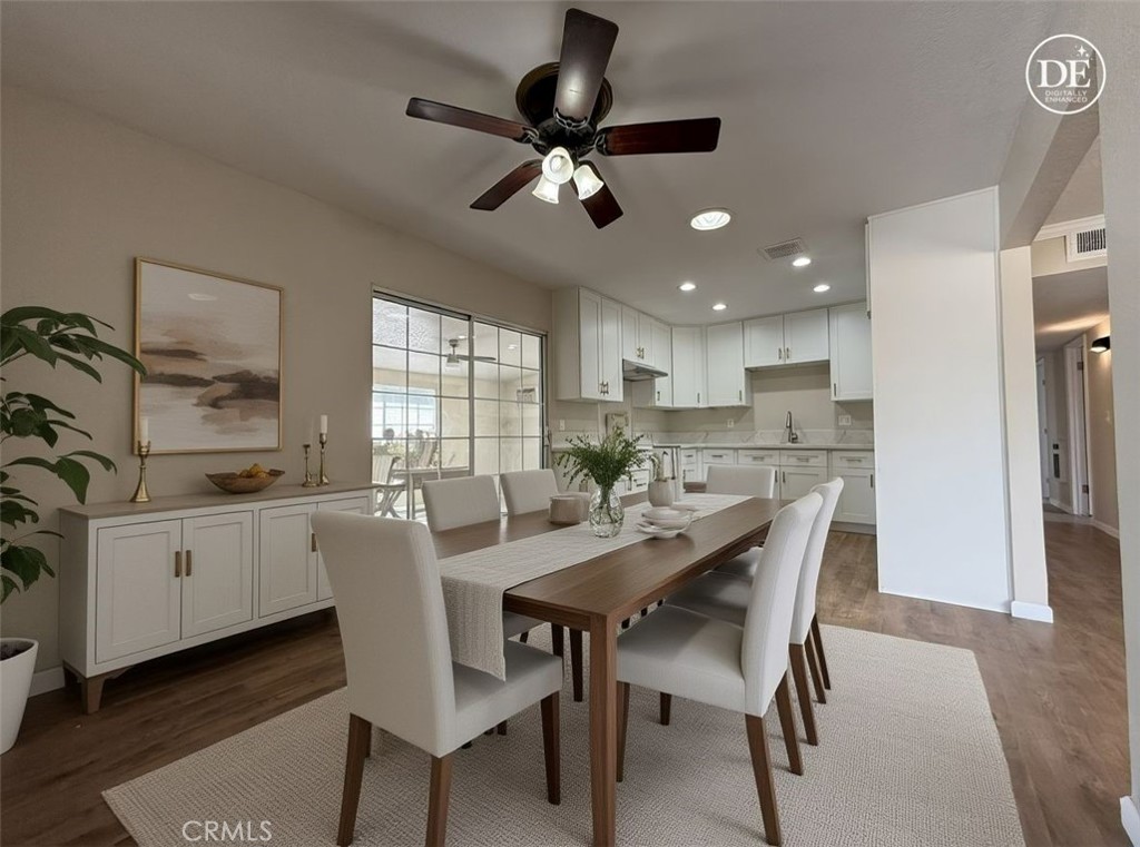 930 West Franklin Avenue Ridgecrest, CA 93555 - Photo 11 of 31 a view of a dining room with furniture and a chandelier