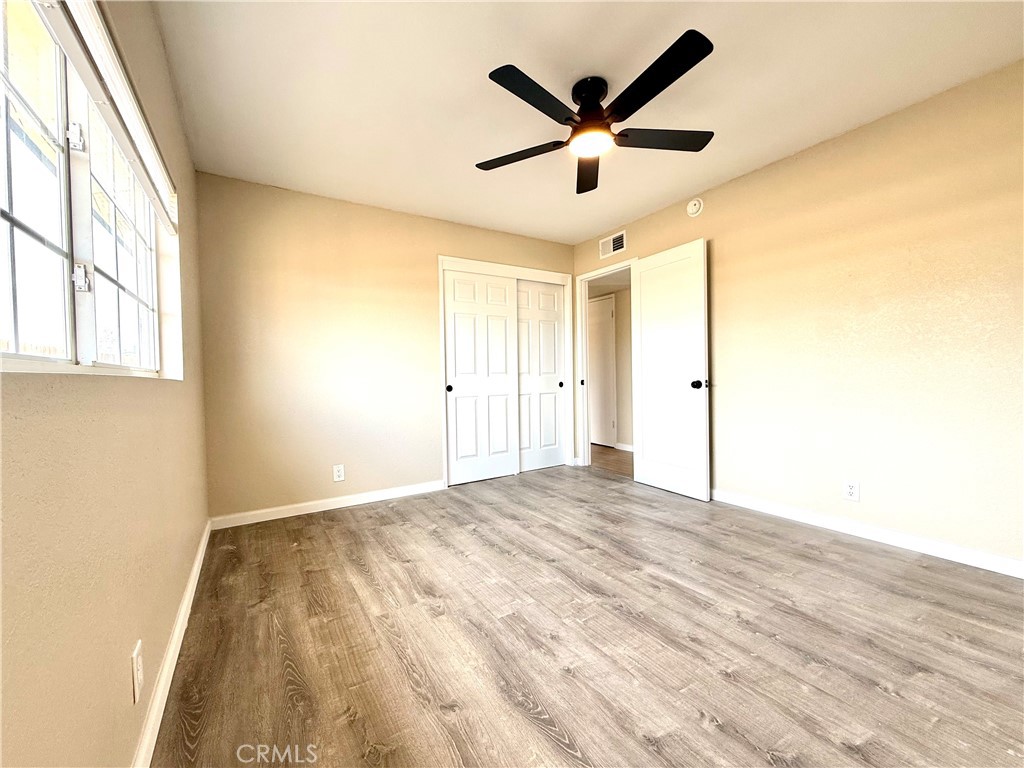 930 West Franklin Avenue Ridgecrest, CA 93555 - Photo 19 of 31 a view of a livingroom with a ceiling fan and window
