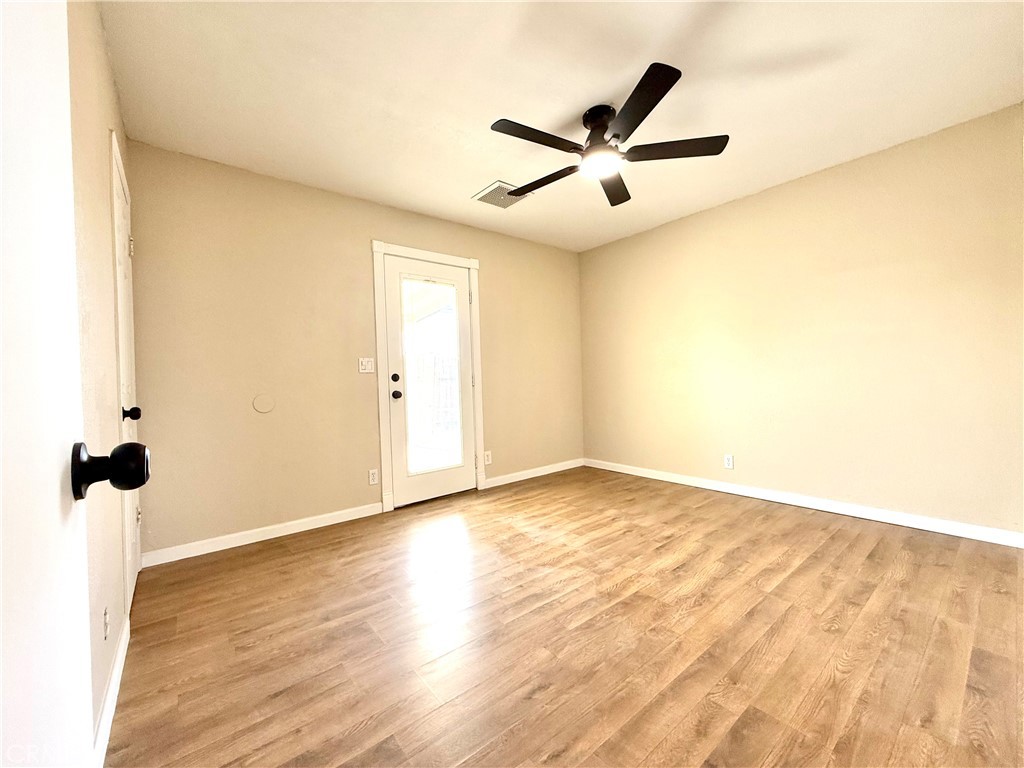 930 West Franklin Avenue Ridgecrest, CA 93555 - Photo 20 of 31 a view of empty room with wooden floor