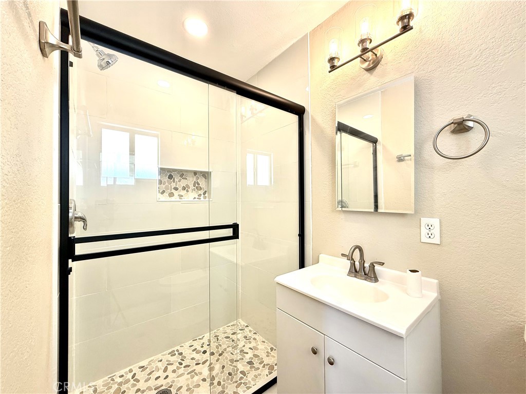 930 West Franklin Avenue Ridgecrest, CA 93555 - Photo 24 of 31 a bathroom with a sink and a mirror