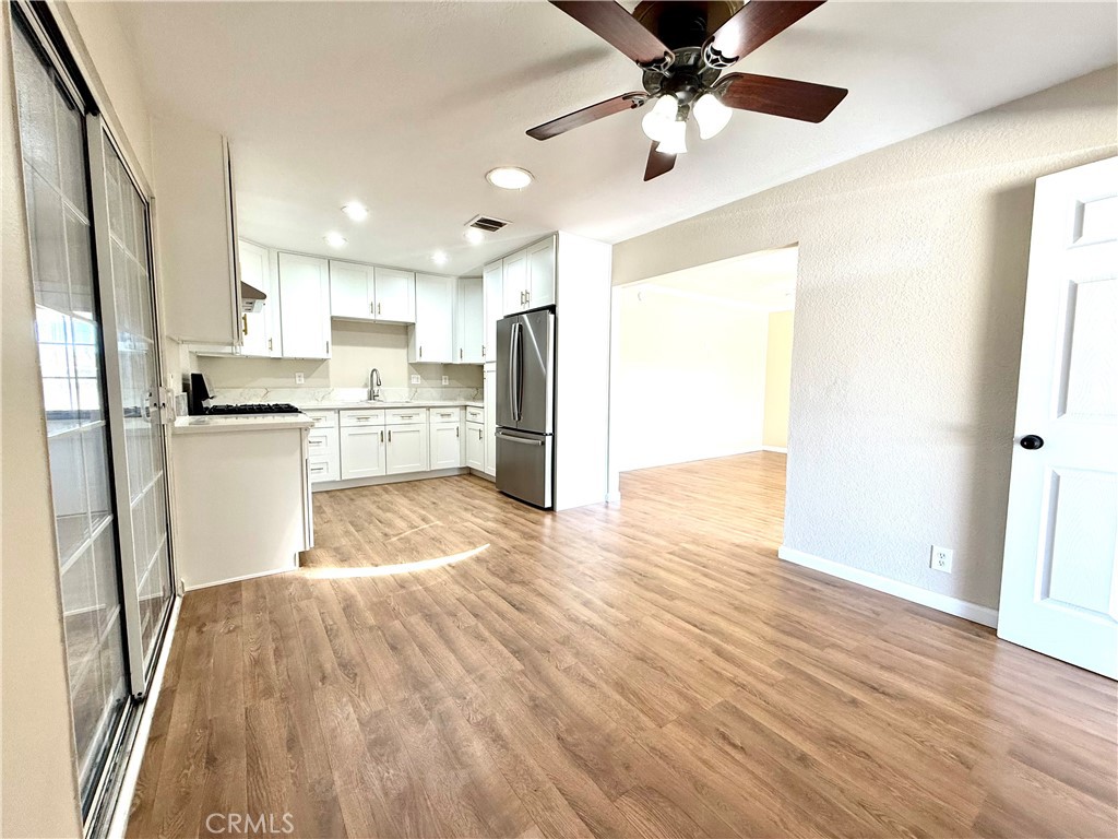 930 West Franklin Avenue Ridgecrest, CA 93555 - Photo 10 of 31 a kitchen with stainless steel appliances granite countertop a refrigerator and a stove top oven