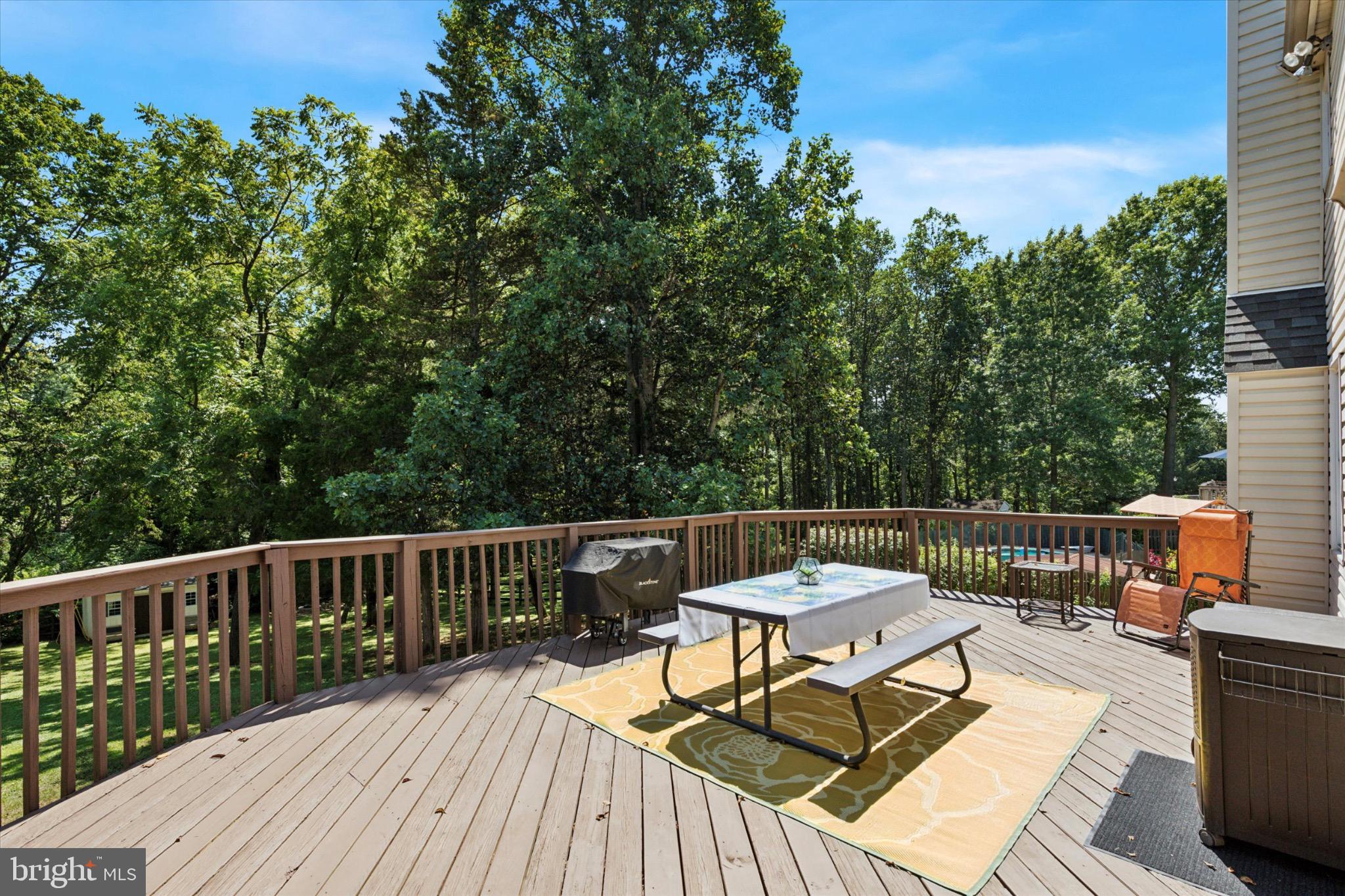 24 Cheyenne Road Royersford, PA 19468 - Photo 28 of 32 Spacious deck with serene wooded views.
