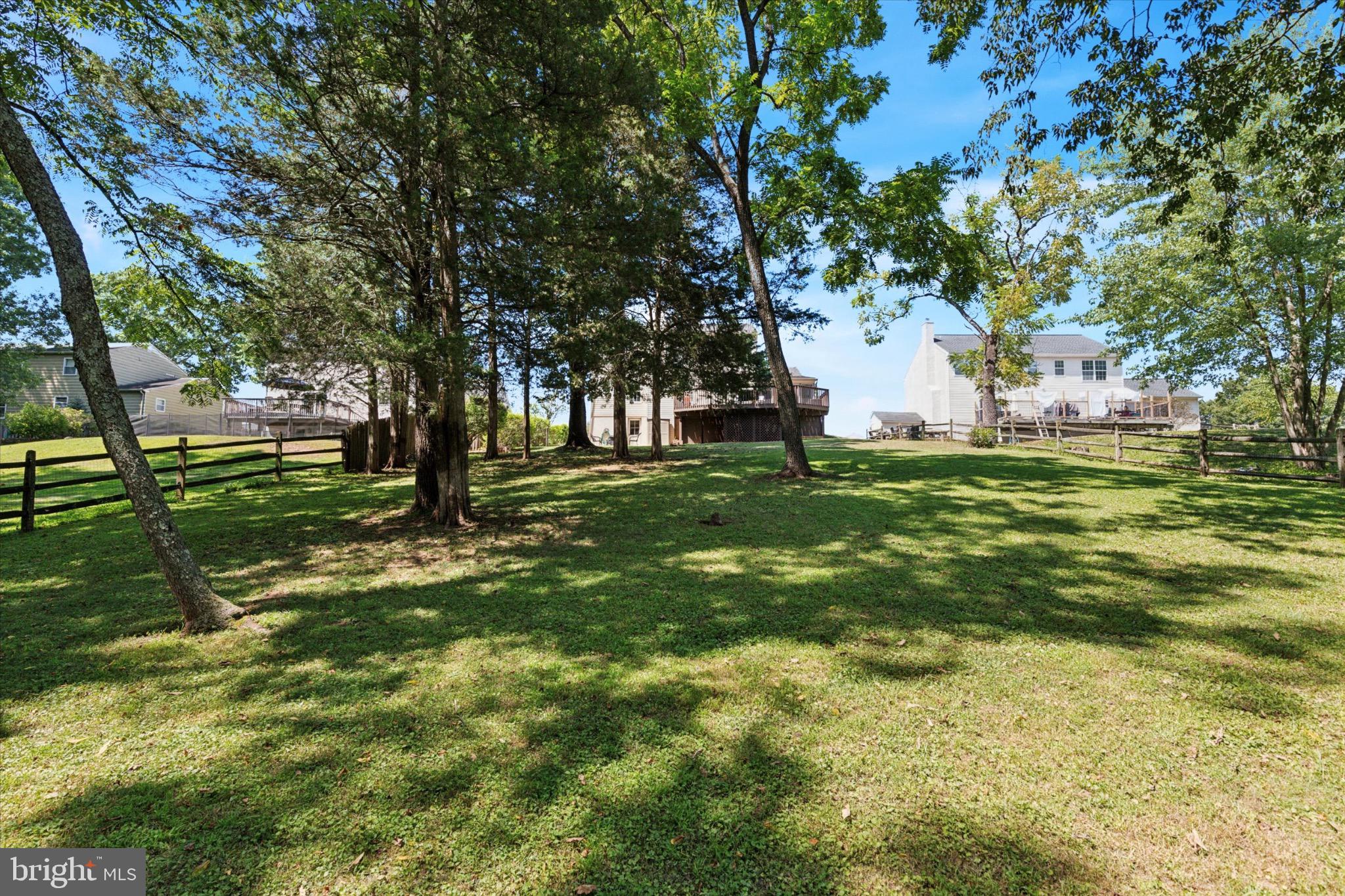 24 Cheyenne Road Royersford, PA 19468 - Photo 30 of 32 Serene backyard oasis with lush greenery.