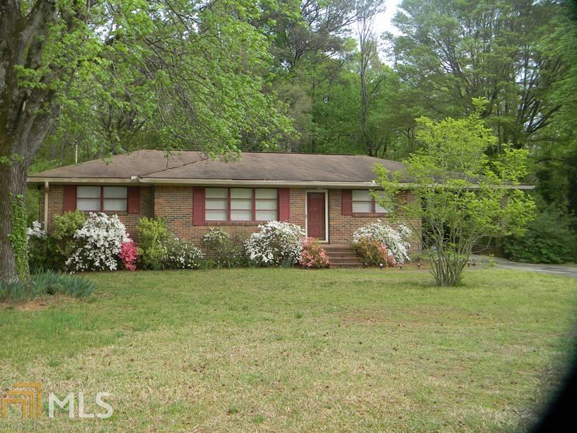 9 Meadow Lane Southwest, Unit 88 Rome, GA 30165 - Photo 1 of 1 a front view of a house with garden